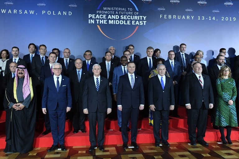 US Vice President Mike Pence, Poland's President Andrzej Duda, Prime minister of Israel Benjamin Netanyahu, US Secretary of State Mike Pompeo pose for a family photo at the Warsaw summit, on 13 February, 2019 (AFP)