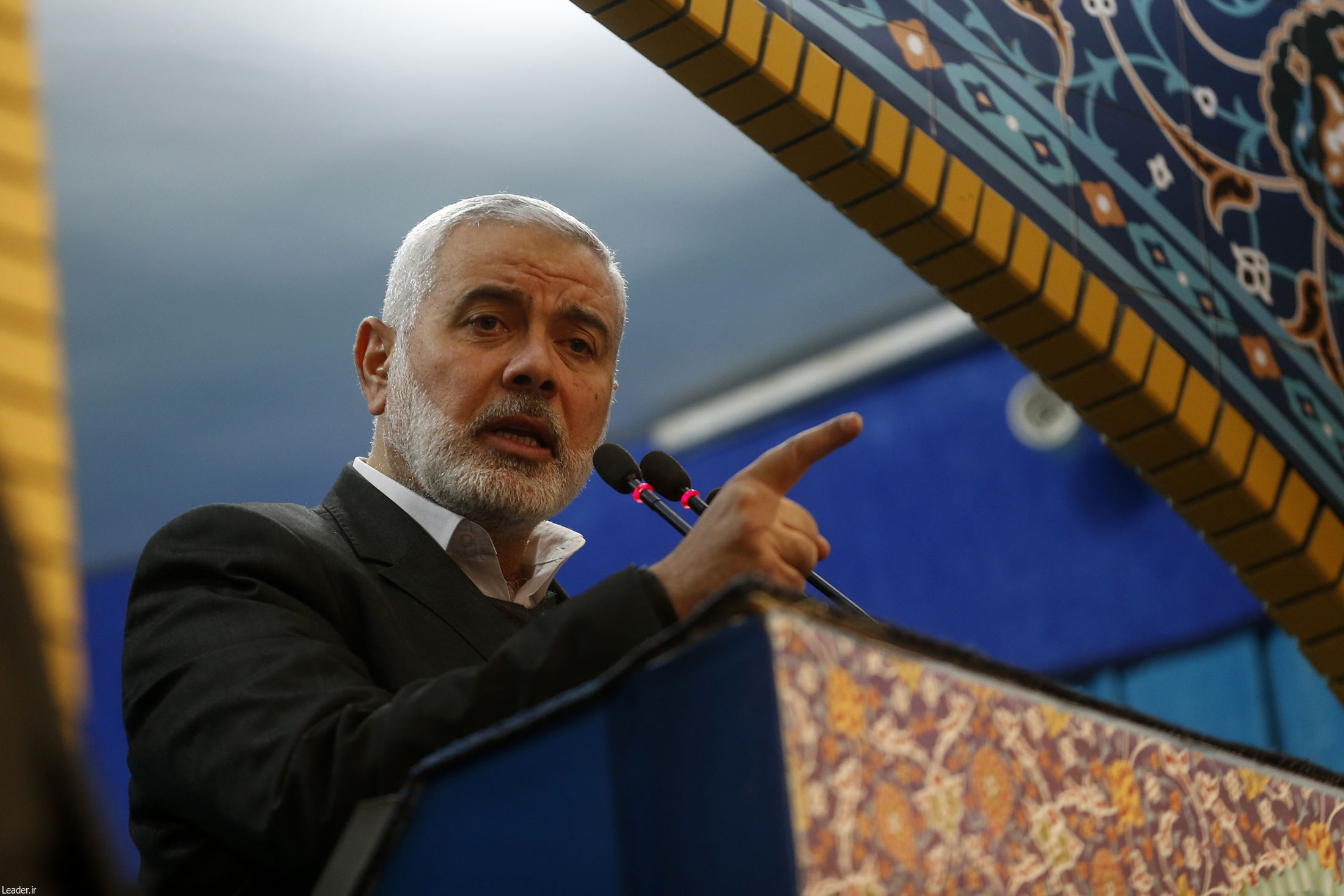 Palestinian Hamas movement leader Ismail Haniya addresssing the crowd during a prayer for Qassem Suleimani (AFP)