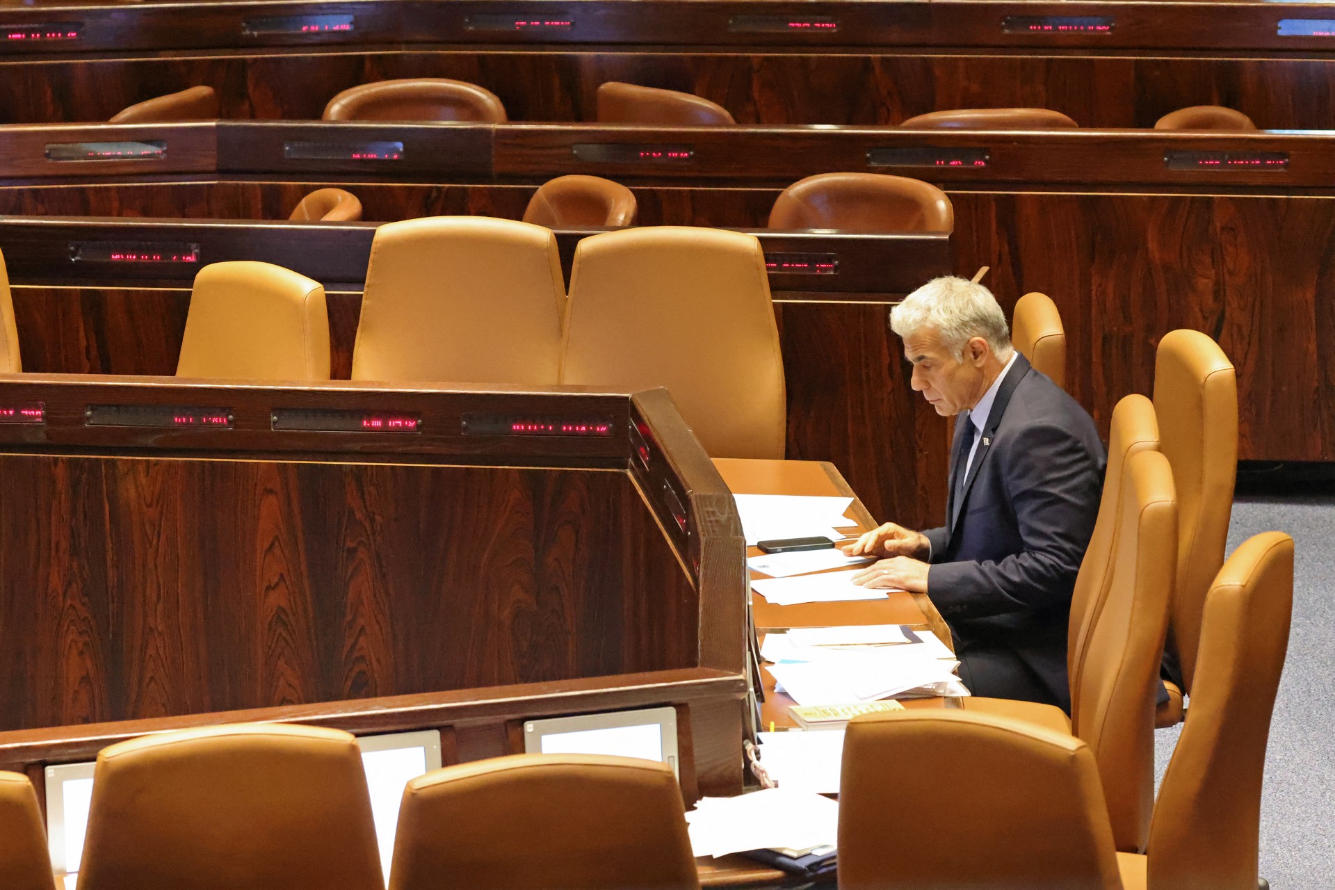 Yair Lapid will be campaigning as caretaker prime minister (AFP)