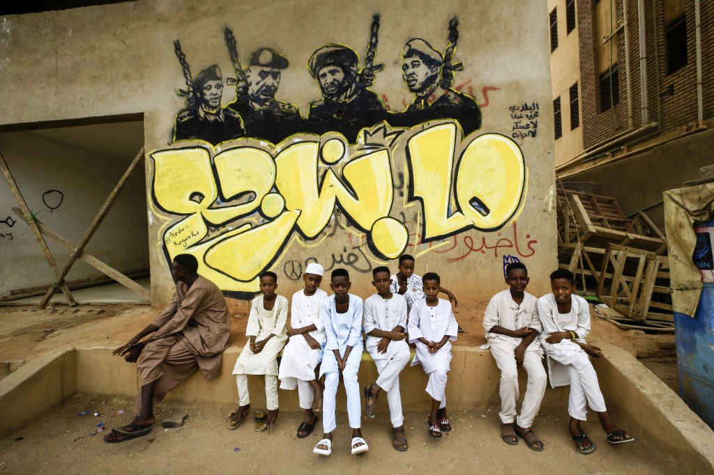 Sudanese protesters take part in an anti-military sit in, on the Eid al-Adha holiday, in the capital Khartoum, on July 9, 2022 (AFP)