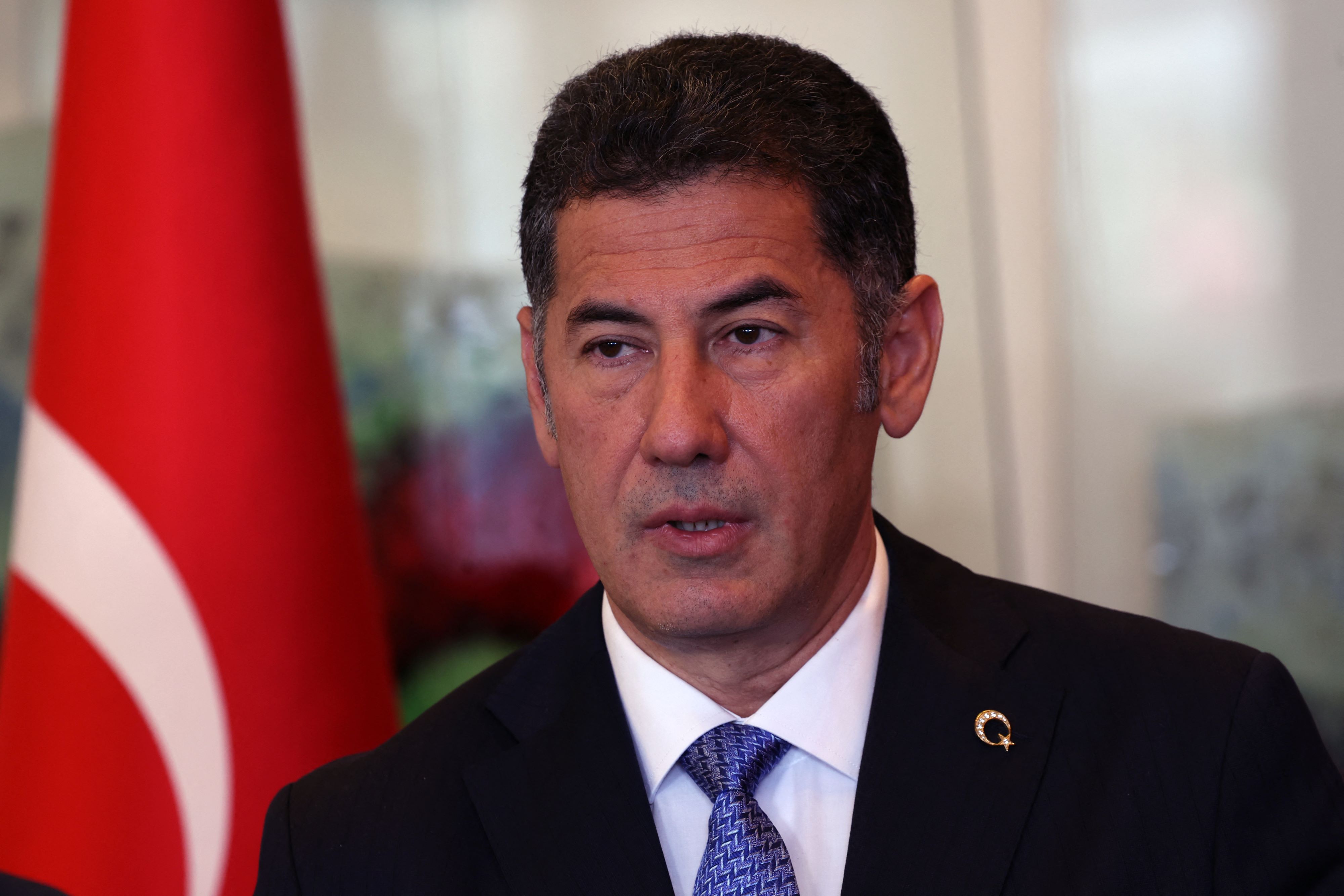 Sinan Ogan, Turkish academician and presidential candidate of the ATA (Ataturk) nationalist alliance speaks to the press in April 2023 (AFP)