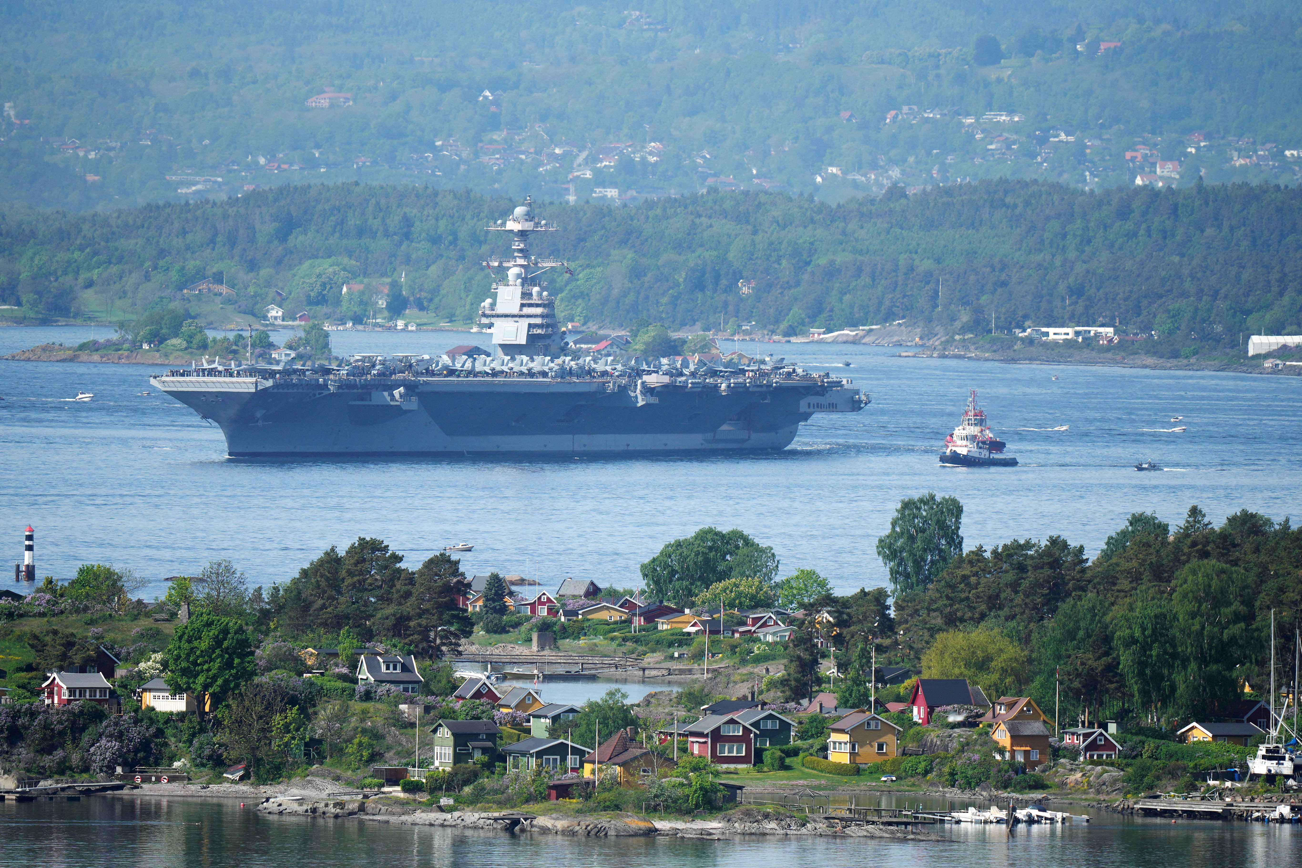 USS Gerald R. Ford aircraft carrier, pictured in the Oslo Fjord of Norway in May 2023, is the world's largest warship (AFP/File photo)