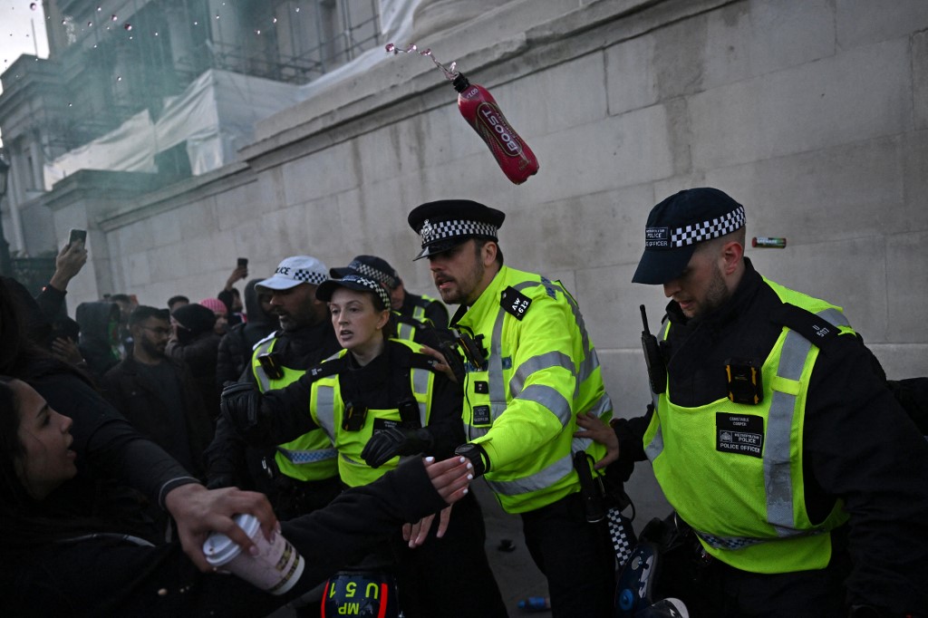 Police officers at a protest in London. (AFP)