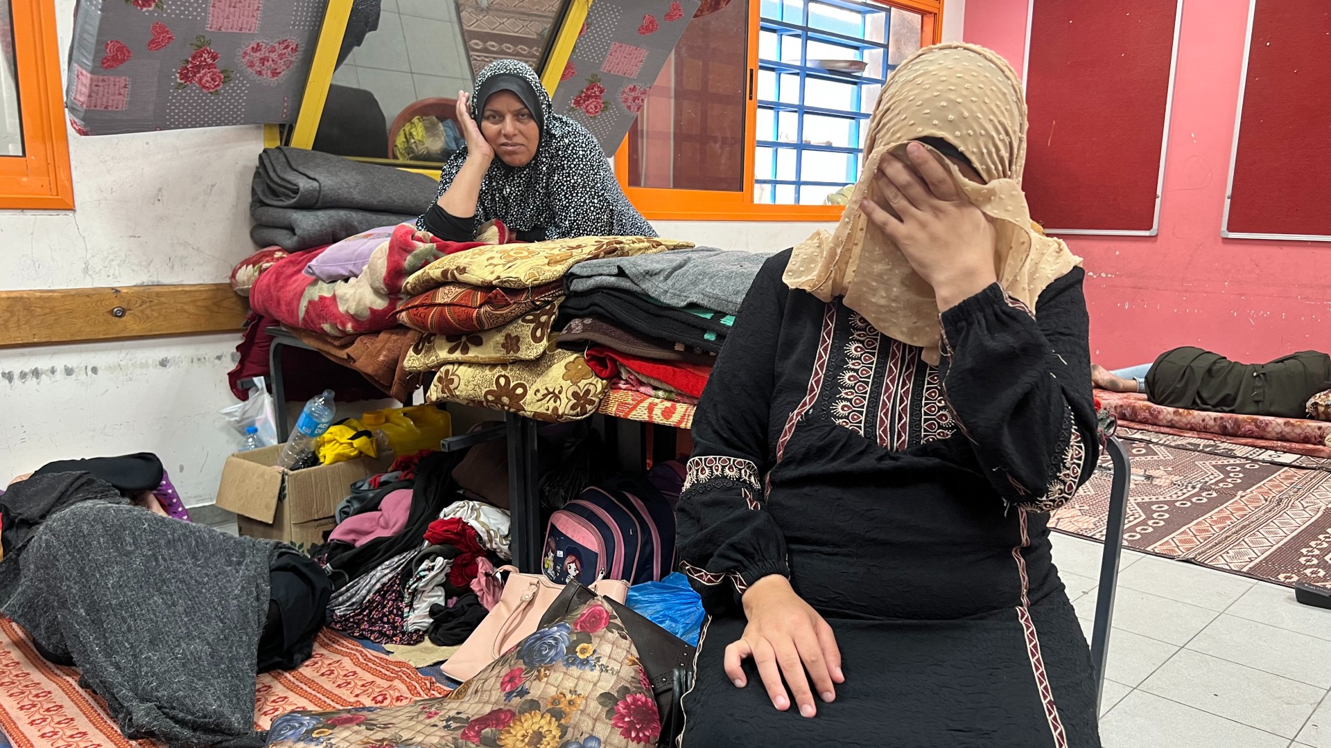 A woman who is eight-months pregnant in Rafah in the southern Gaza Strip, 10 November (AFP)