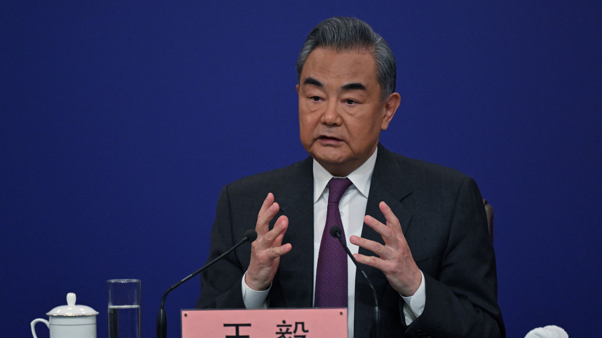 China's Foreign Minister Wang Yi attends a press conference for the Second Session of the 14th National People’s Congress (NPC) in Beijing on 7 March 2024 (Pedro Pardo/AFP)
