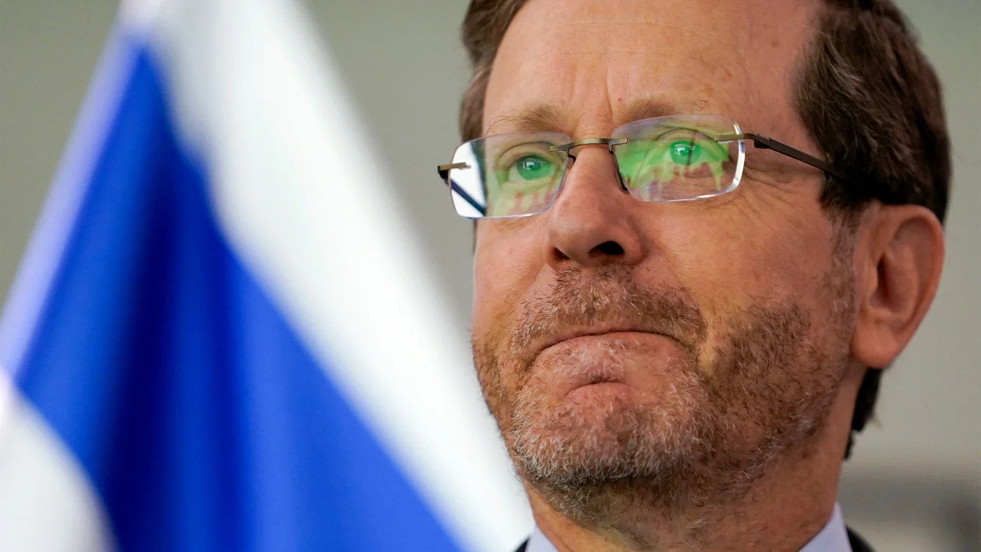 Israel's President Isaac Herzog, who has the authority to grant pardons (AFP/Nathan Howard)