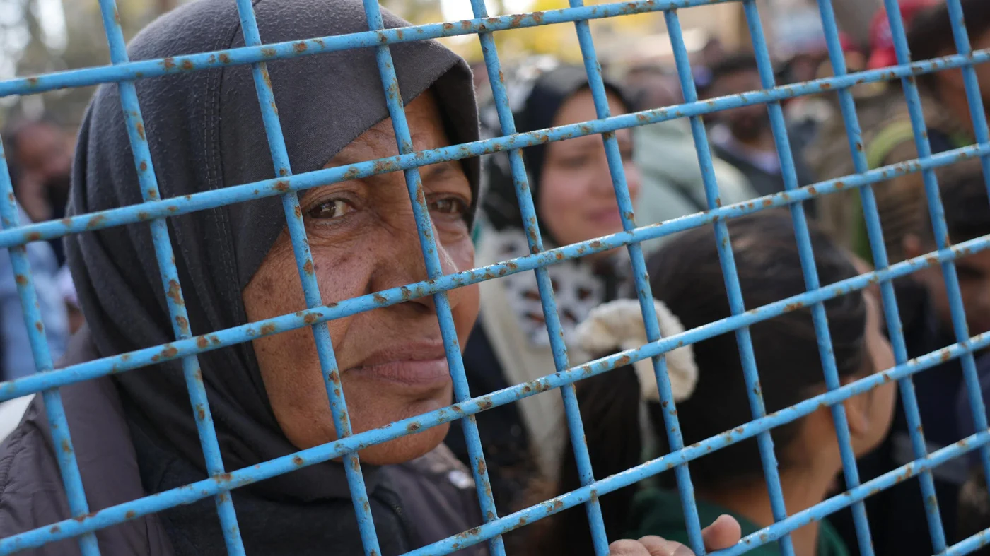 A relative of a freed Palestinian prisoner awaits their arrival at the European Hospital in Khan Younis in the southern Gaza Strip on 15 February 2025 (AFP/Bashar Taleb)