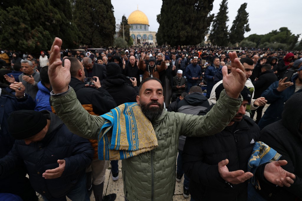 Palestinian Muslims pray at the Al-Aqsa mosque compound in Jerusalem's Old City during the first Ramadan Friday prayer, on March 7, 2025. (Ahmad Gharabli/AFP)