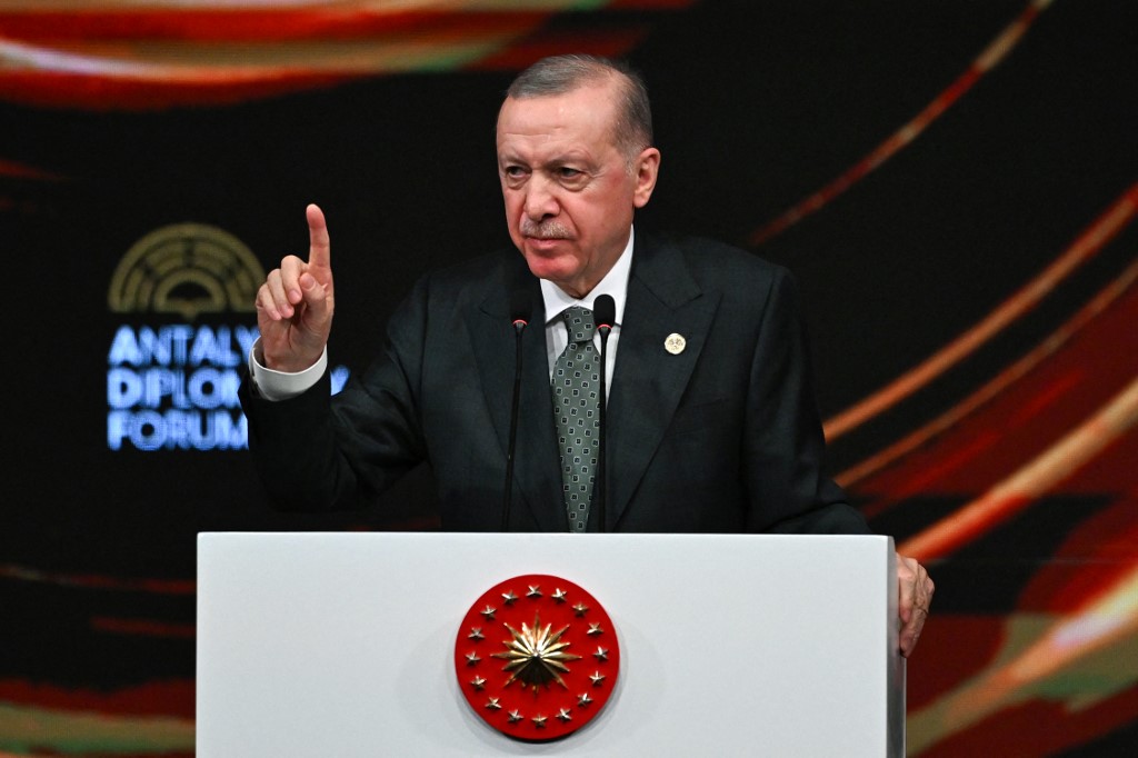 Turkey's President Recep Tayyip Erdogan delivers a speech during the opening ceremony of the 4th edition of the Antalya Diplomacy Forum (ADF2025) in Antalya, on April 11, 2025. Ozan KOSE / AFP