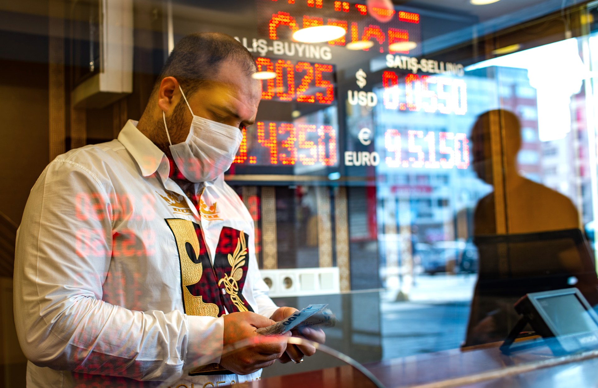 The coronavirus pandemic prompted the Turkish lira to hit new lows (AFP)