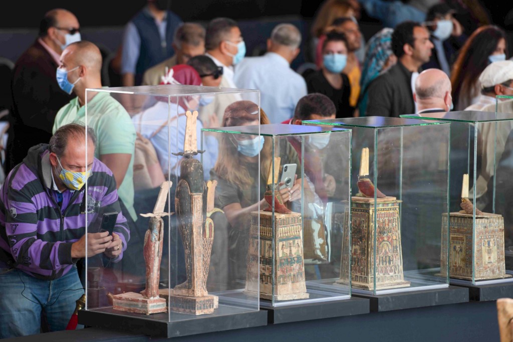 Wooden statues were also found earlier this month (AFP) 