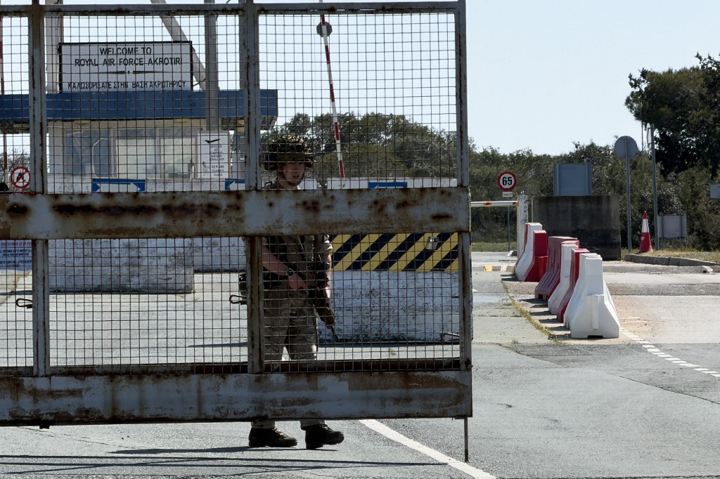 A British soldier mans a gate at RAF Akrotiri base following two reported drone attacks near Limassol on March 2, 2026. 