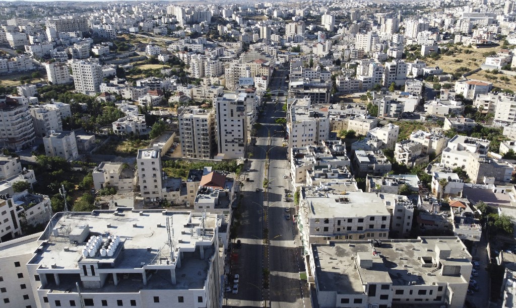 Aerial shot showing the deserted streets of Hebron as Palestinians observe a general strike across the occupied territories and Palestinian towns in Israel (AFP) 