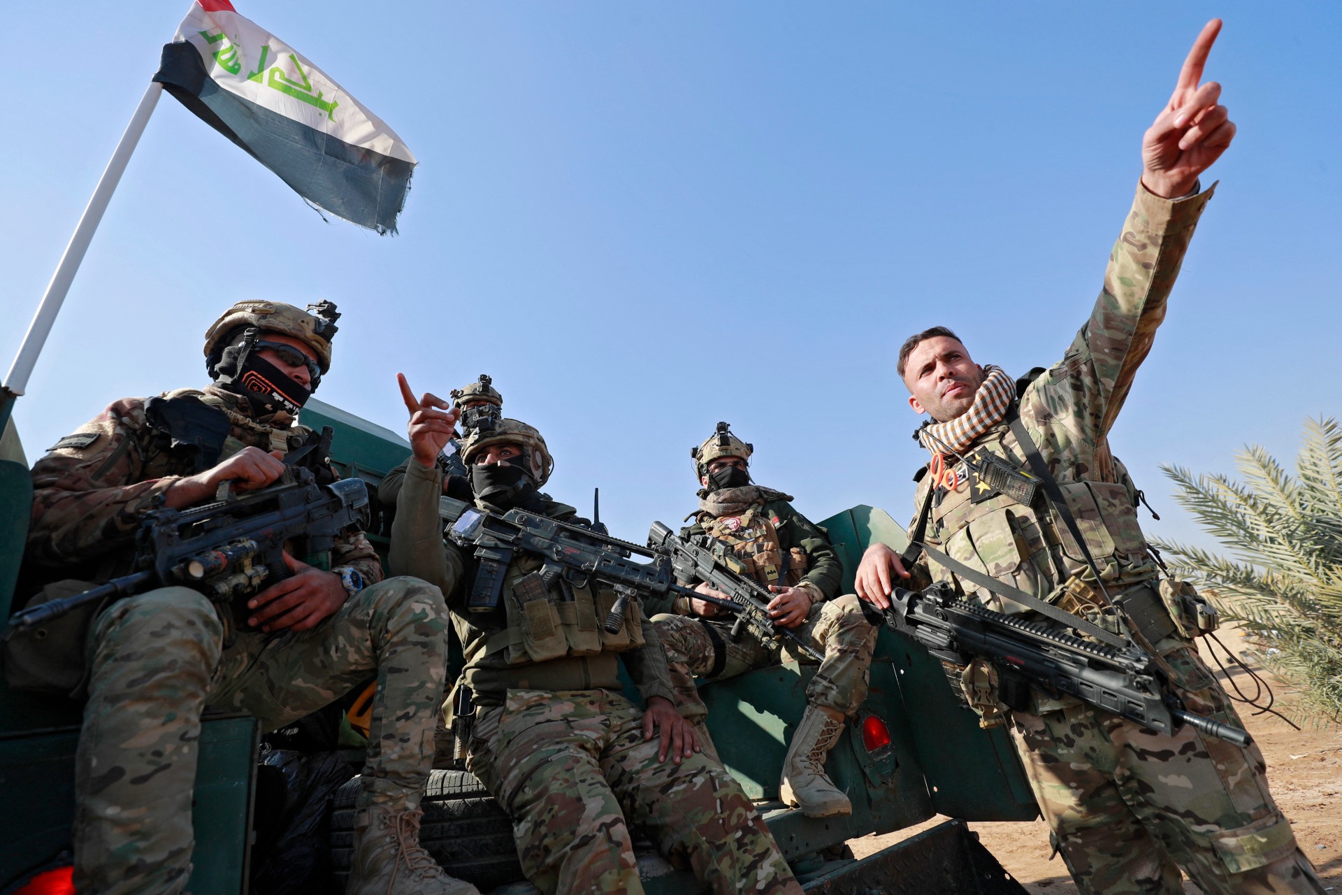 Rapid Intervention forces prepare for an operation against Islamic State militants in Diyala on 24 January (AFP)