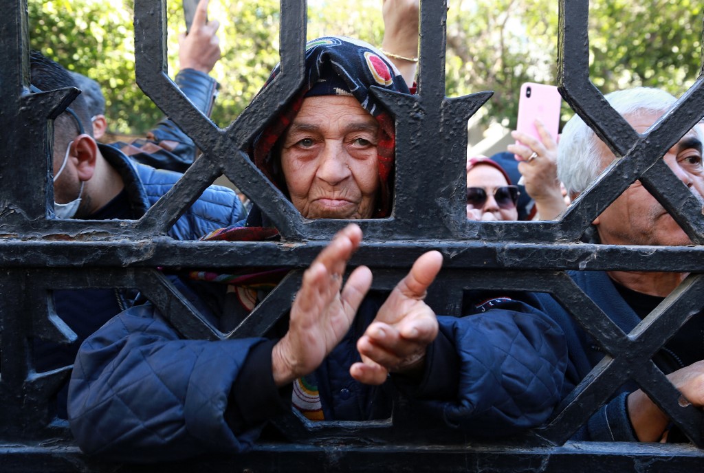 Tunisians join a protest by judges against the dissolution of the Supreme Judicial Council (CSM) in Tunis on 10 February 2022. (AFP) 