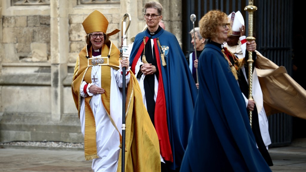 Archbishop of Canterbury Sarah Mullally smiles as she departs following her installation ceremony at Canterbury Cathedral, south-east England on March 25, 2026. (Henry Nicholls/AFP)