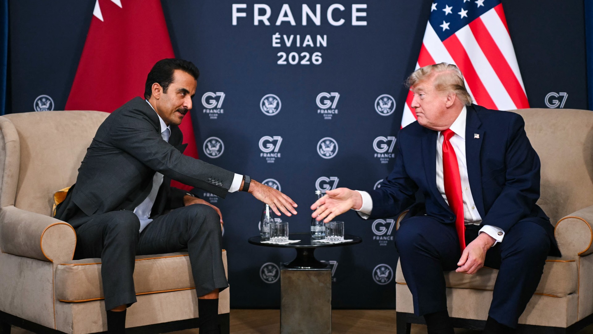 US President Donald Trump (R) attends a bilateral meeting with Qatar's Emir Sheikh Tamim bin Hamad al-Thani during the G7 summit, in Evian, eastern France, on June 16, 2026 Mandel NGAN / AFP