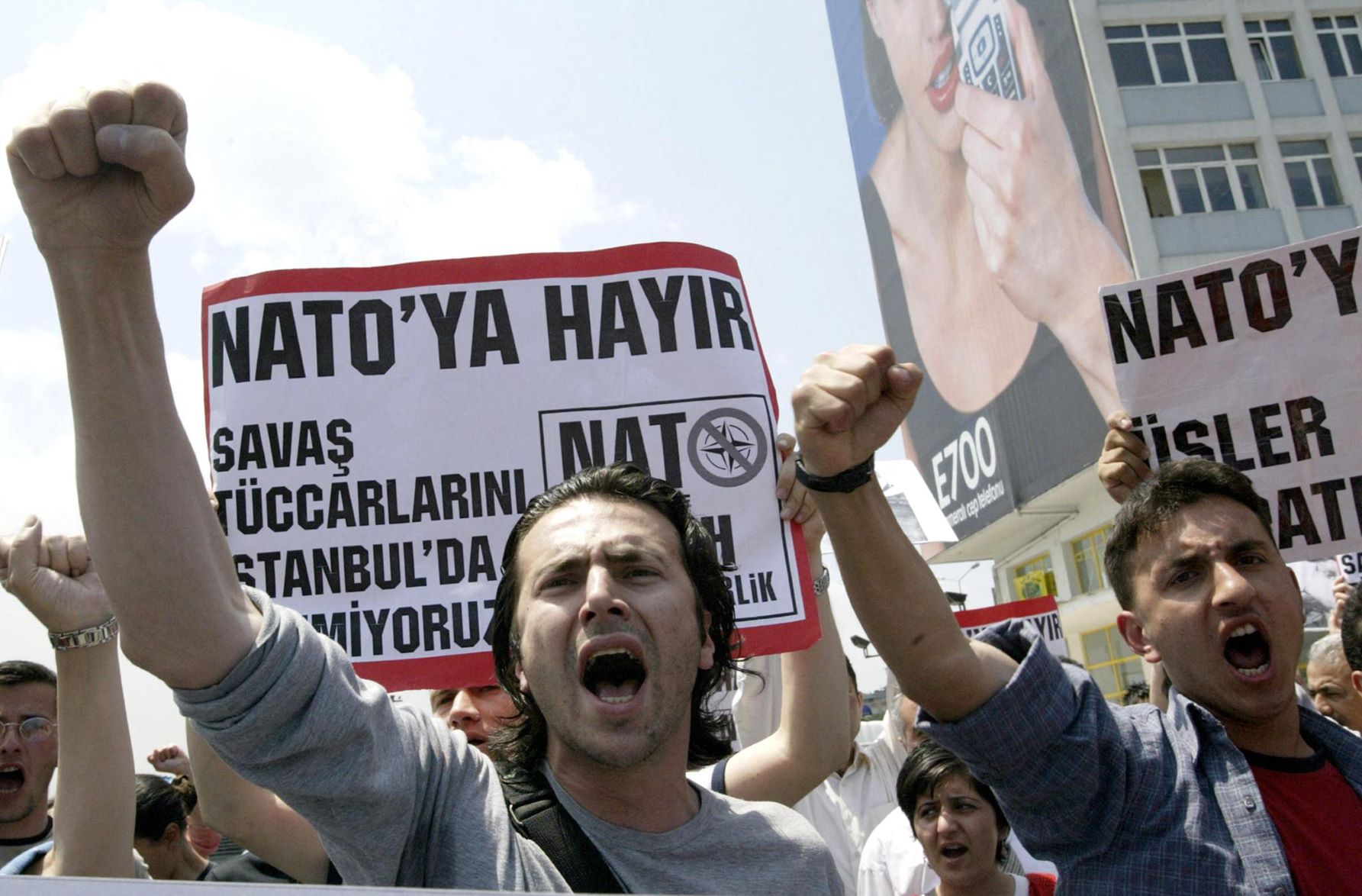 Two Turkish protestors chant slogans 
