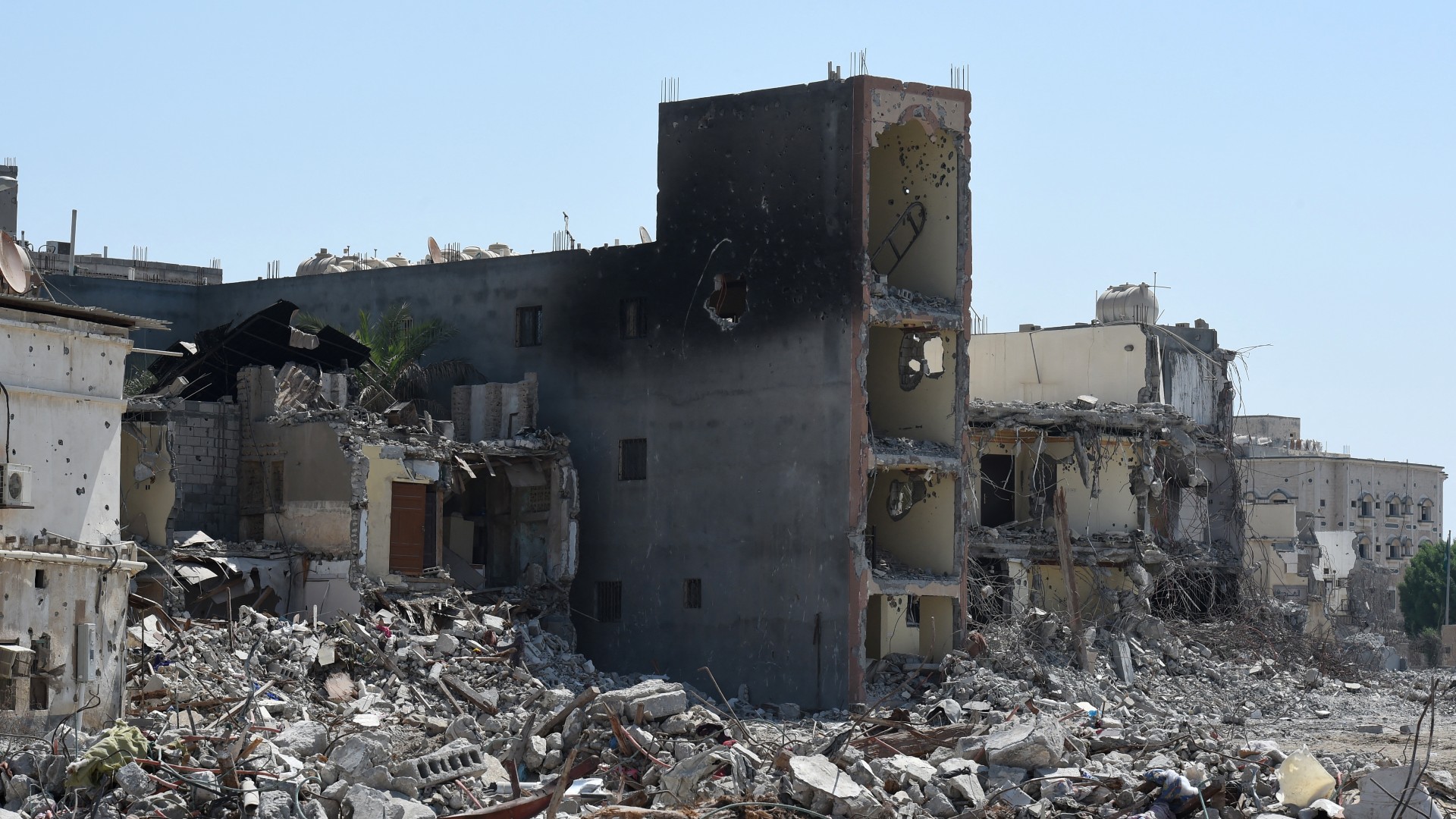 Destruction in the Qatif town of Awamiya in 2017 following unrest (AFP)