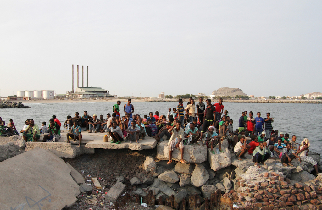 African illegal immigrants wait to board a boat in the southern port city of Aden on September 26, 2016, before being deported to Somalia (AFP)