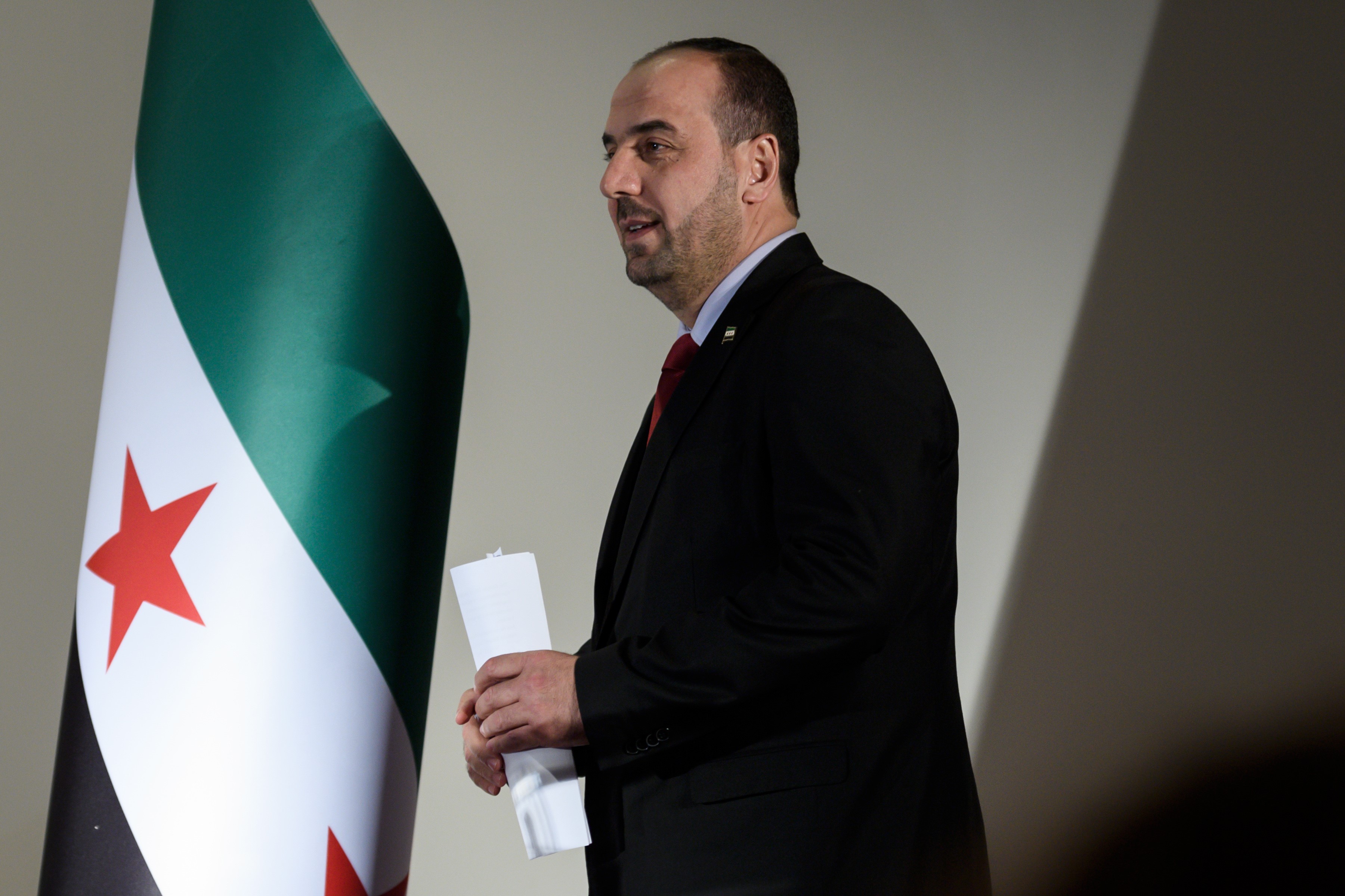  Syria's main opposition High Negotiations Committee (HNC) head Nasr al-Hariri attends a press conference on the eve of a new round of peace talks on 27 November, 2017 in Geneva (AFP)