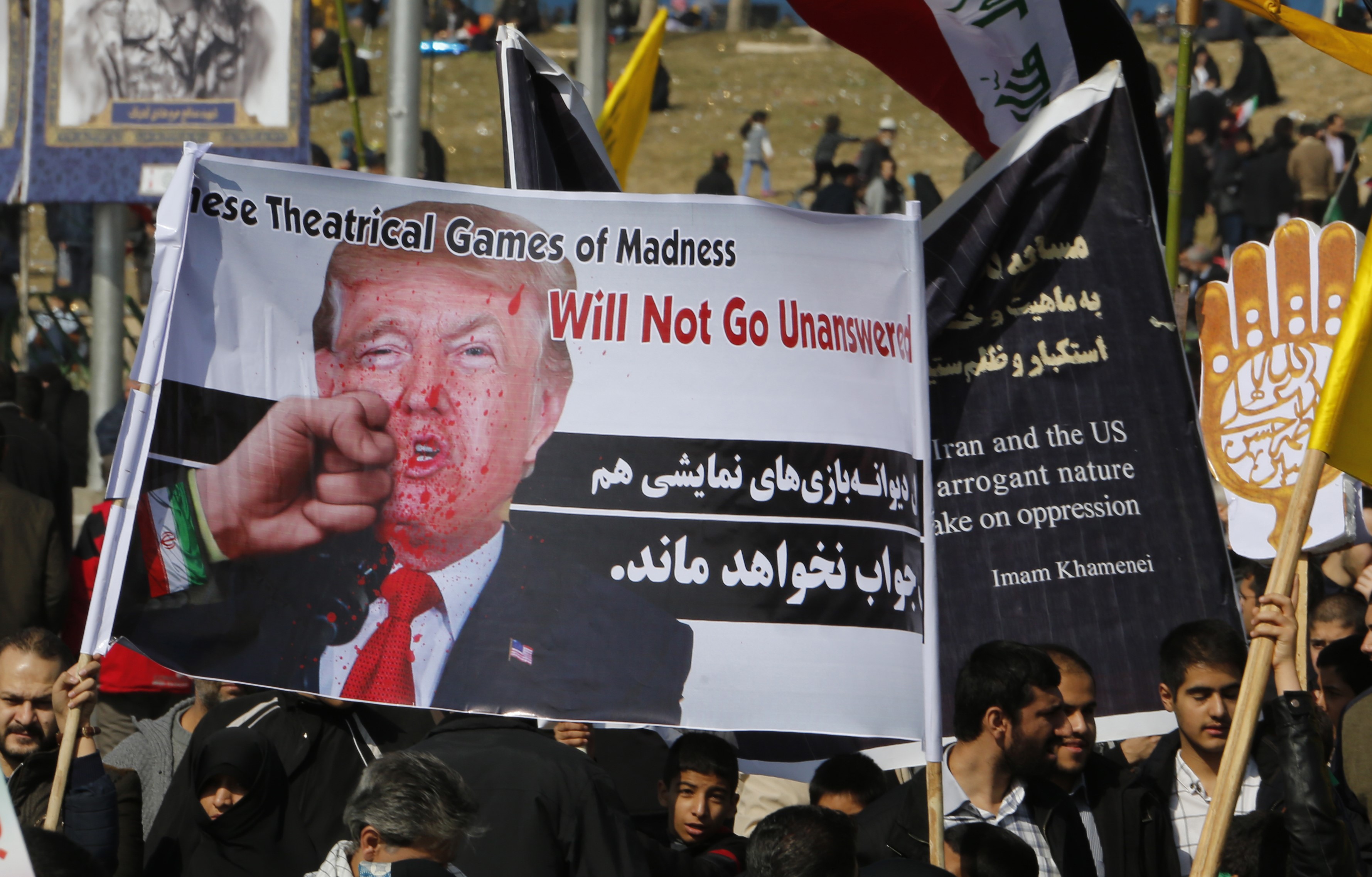 Iranians take part in a rally marking the anniversary of the 1979 Islamic revolution, on 11 February, 2018 (AFP)