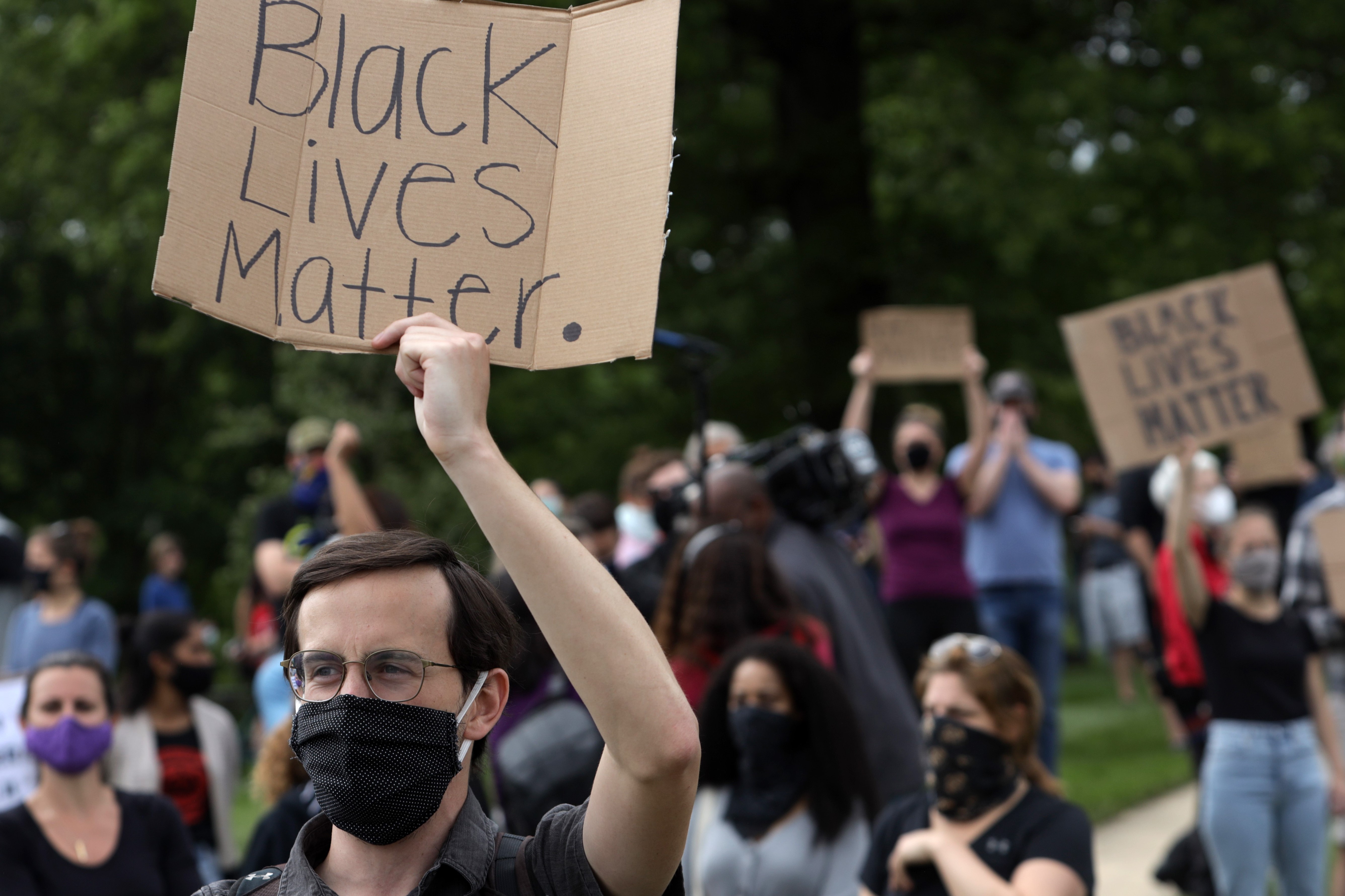 Demonstrators stage a protest near the Saint John Paul II National Shrine, where President Donald Trump planned a visit, in response to the death of George Floyd while under police custody June 2, 2020