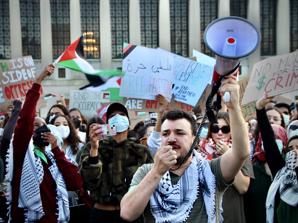 Mahmoud Khalil leads a chant at a protest on the Columbia University campus on October 13, 2023 in New York City.