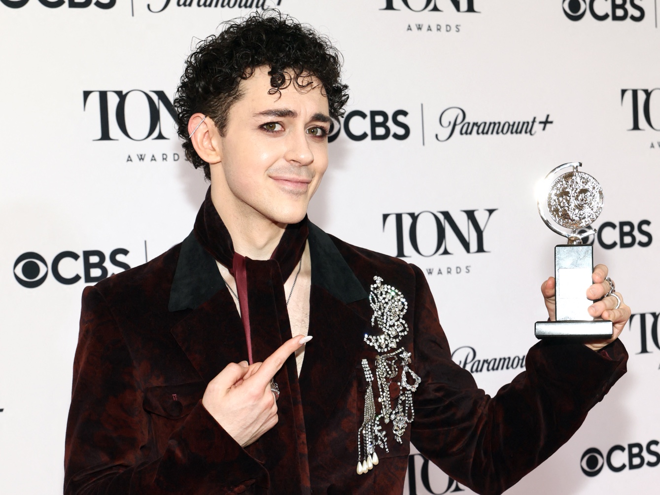 Ali Louis Bourzgui poses with the Best Performance by an Actor in a Featured Role in a Musical award for The Lost Boys at the Tony Awards on 7 June 2026 in New York City (Mike Coppola/Getty Images) 