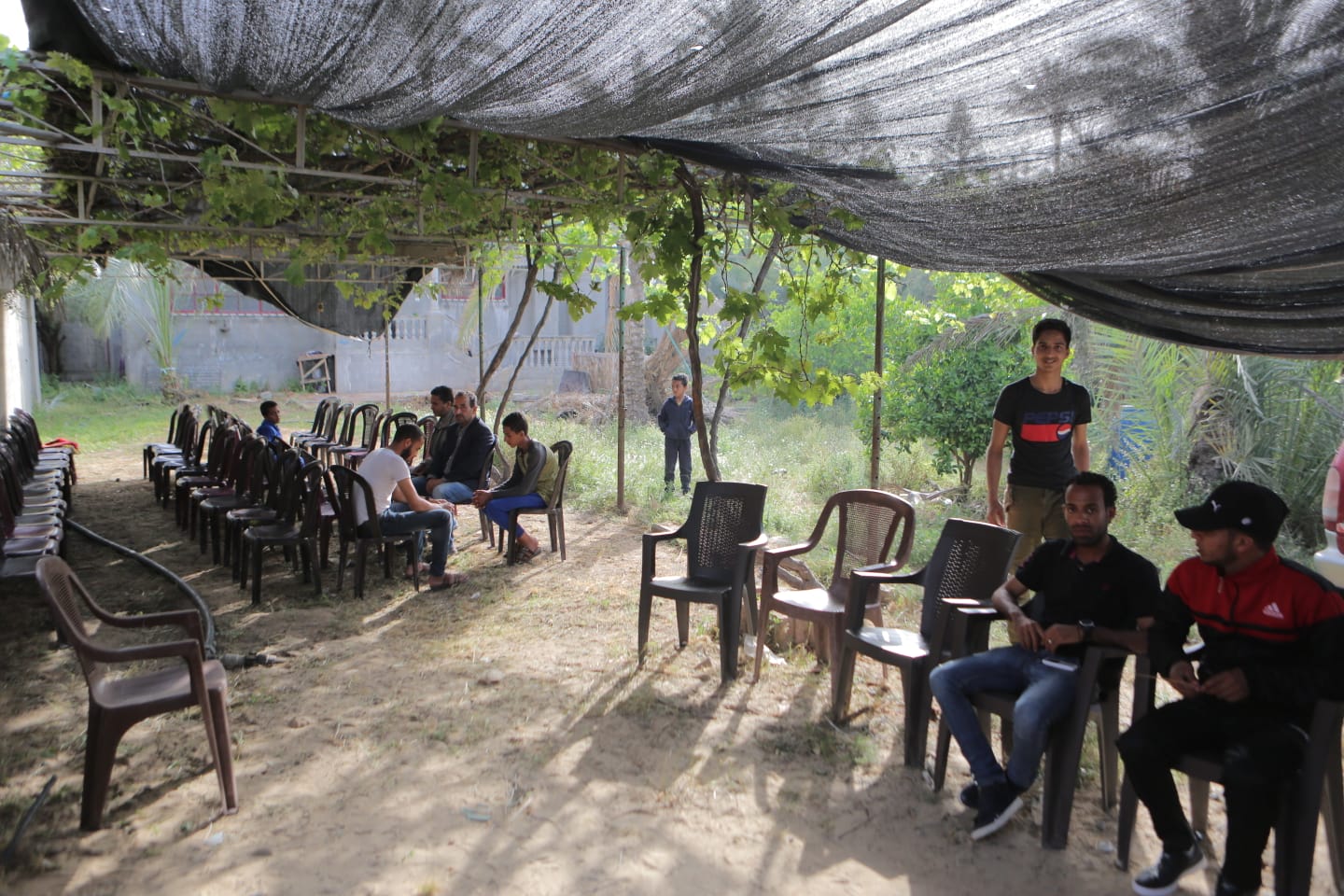 People gather in Gaza at a wake for Zaki Hasan (Mohammed al-Hajjar)