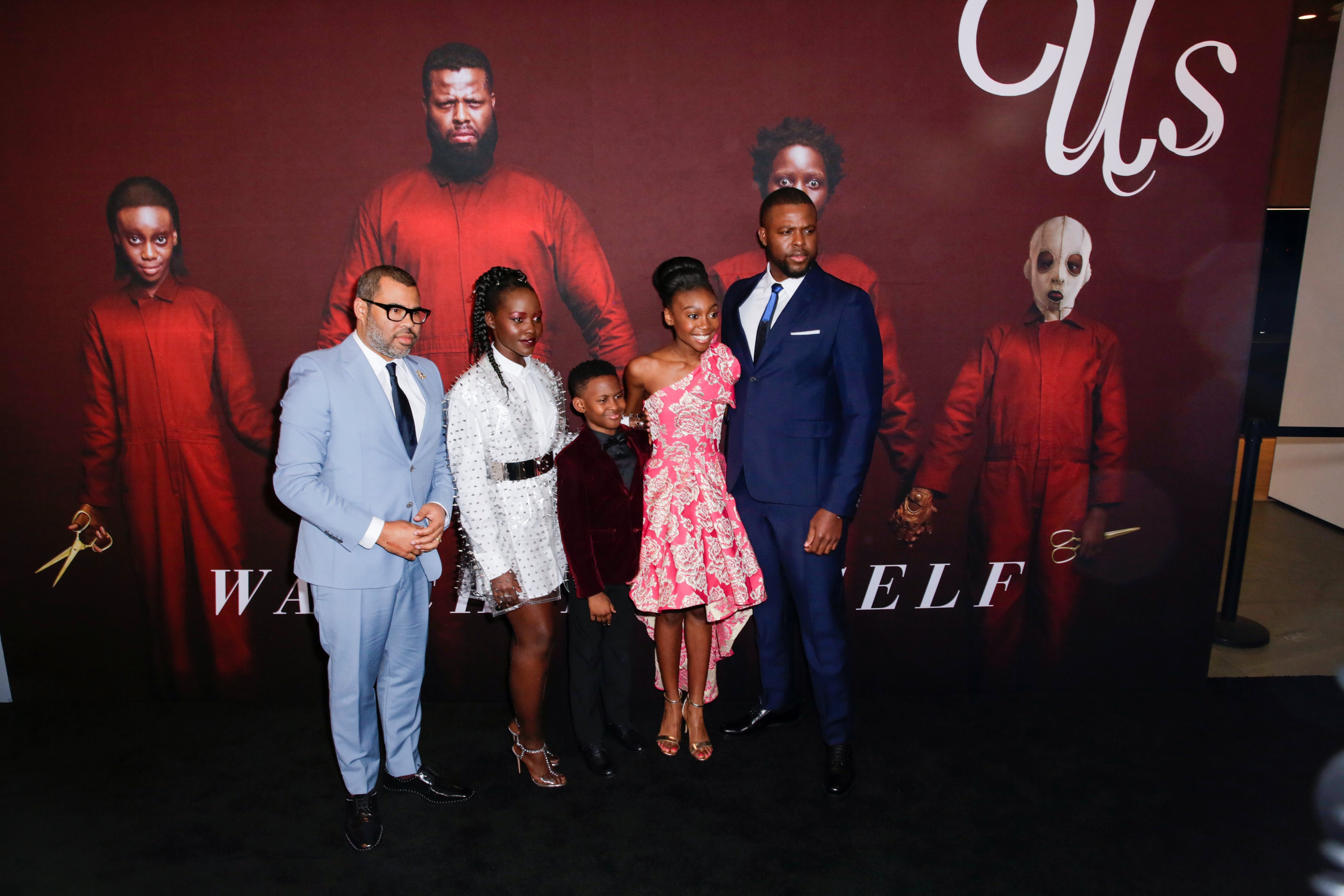 Director Jordan Peele (L) and cast members attend the 