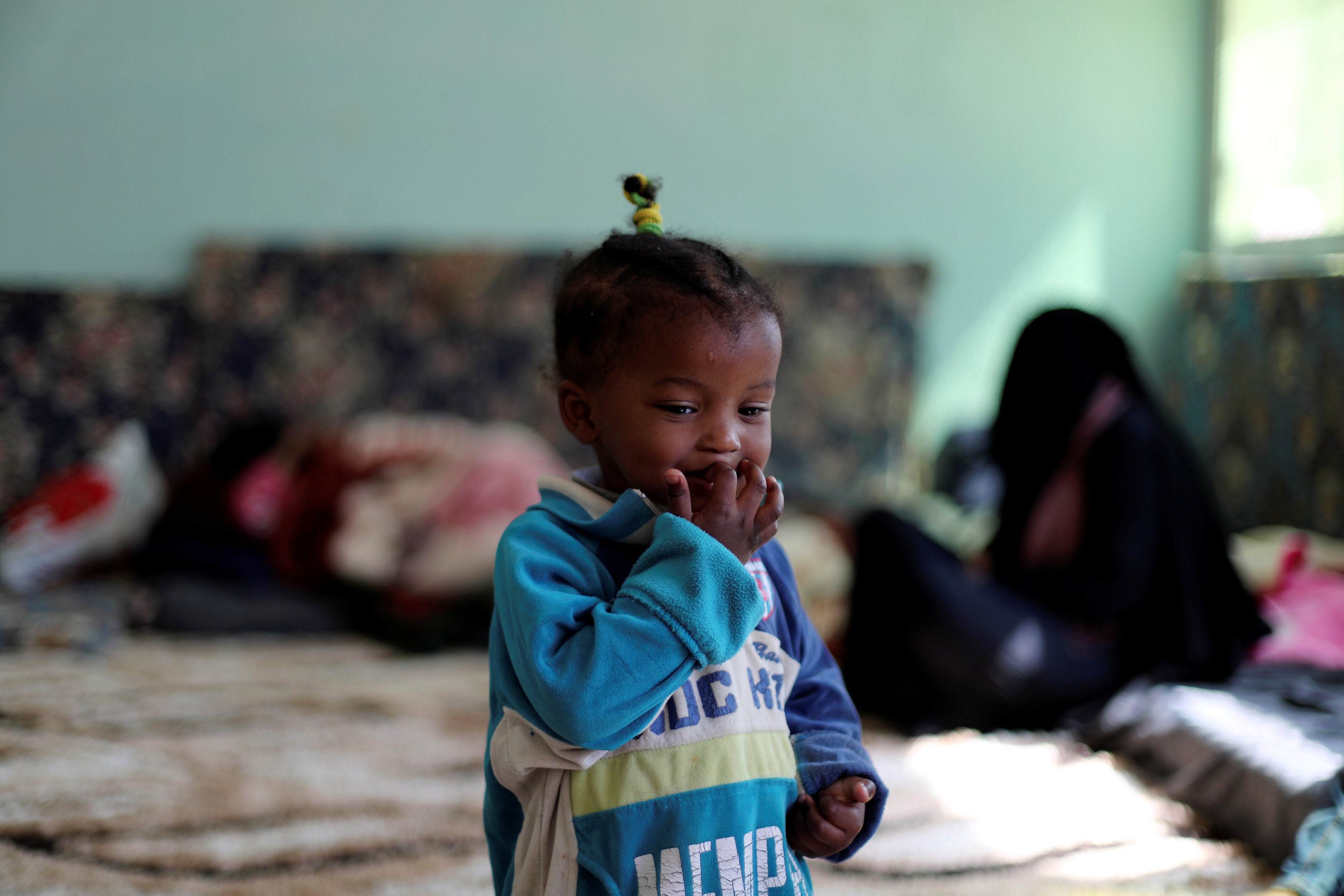  C Libyan displaced child, who fled her house because of the fighting between the Eastern forces commanded by Khalifa Haftar and the internationally recognised government on 14 April (Reuters)