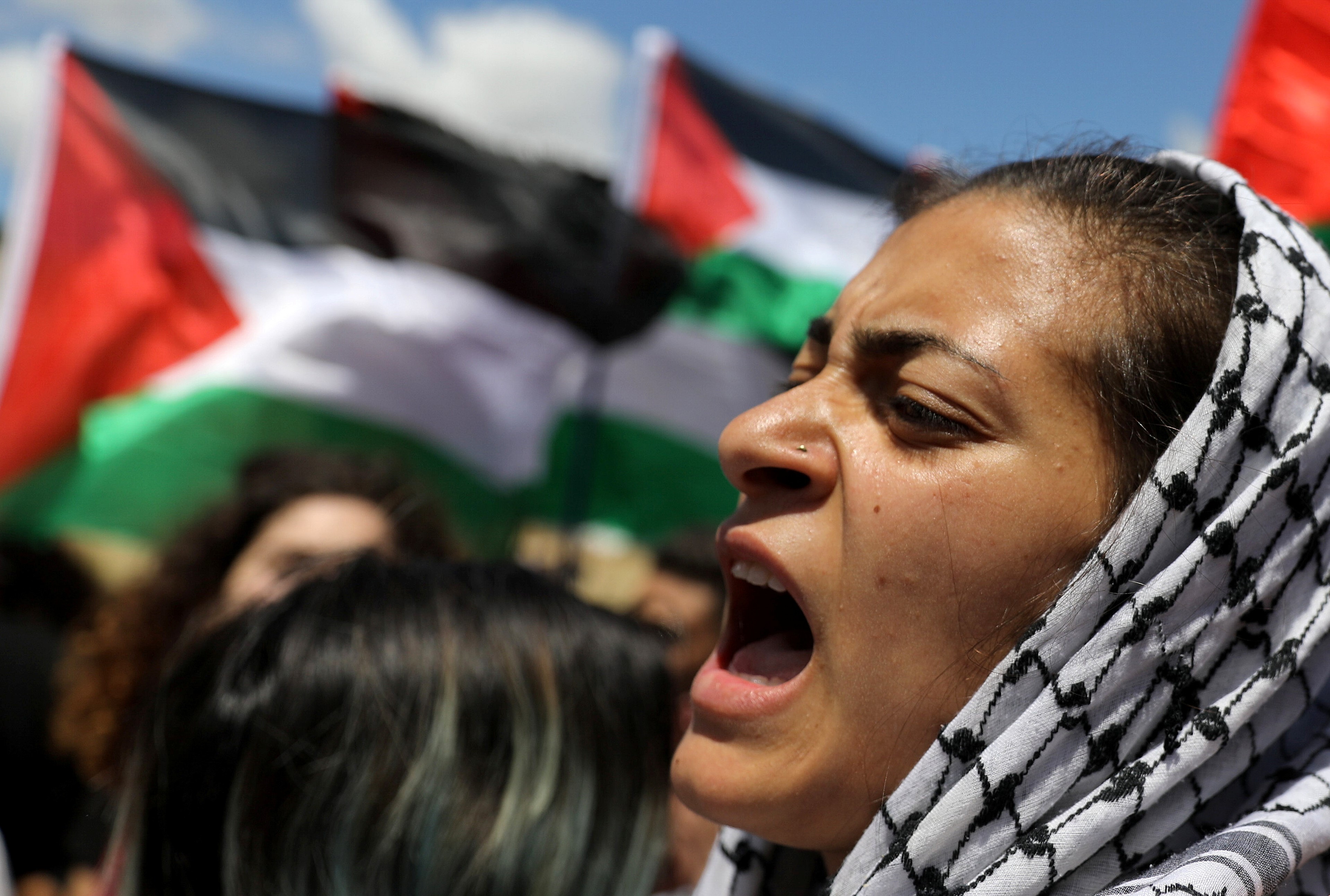 Members of Israel's Arab minority take part in a rally marking the 