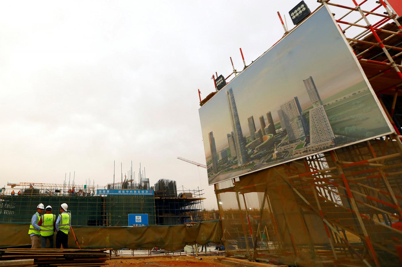 Chinese construction labourers work at the future 