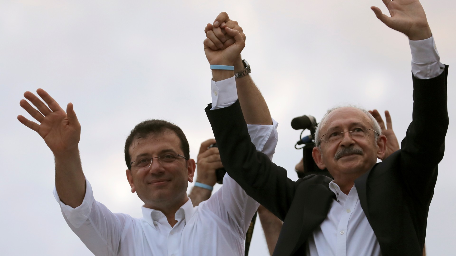 Ekrem Imamoglu Kemal Kilicdaroglu greet their supporters during an election rally in Istanbul in 2019 (Reuters)