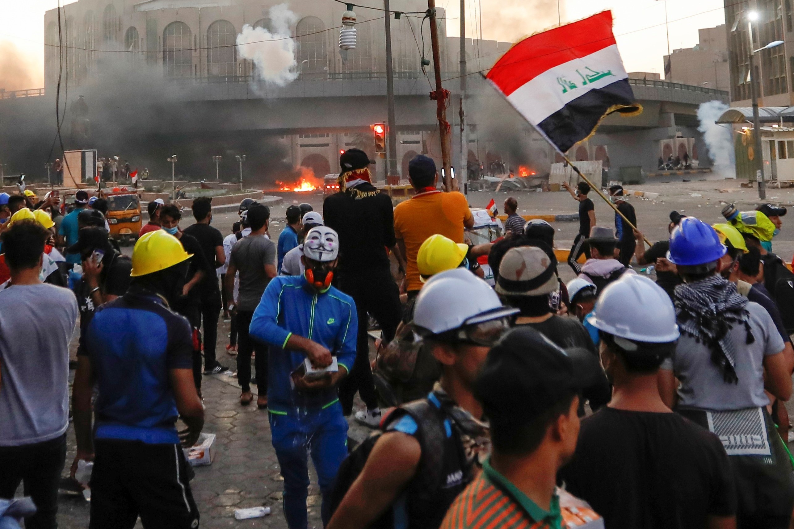 Demonstrators take part in ongoing anti-government protests in Baghdad, Iraq on 4 November (Reuters)