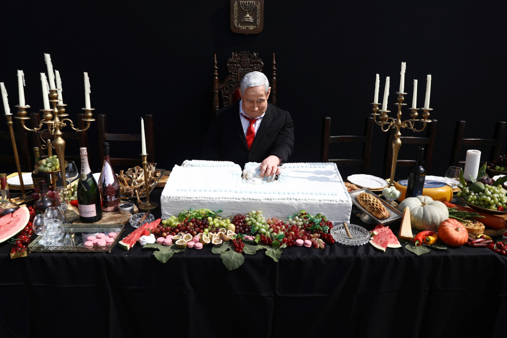 An artwork by Israeli artist Itay Zalait, that includes a sculpture of Israeli Prime Minister Benjamin Netanyahu sitting at a table recalling the famous 