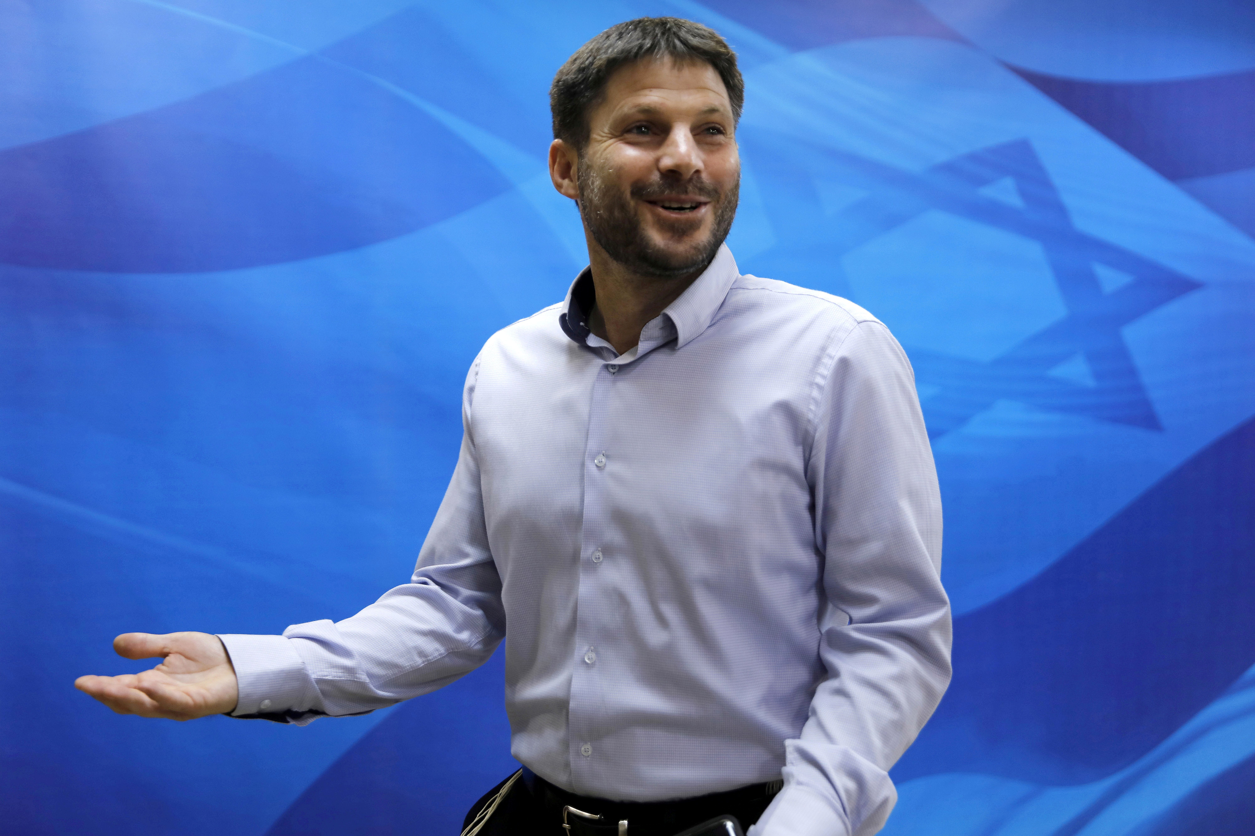 Bezalel Smotrich the Israeli transportation minister arrives to attend a weekly cabinet meeting in 2019 (Reuters)