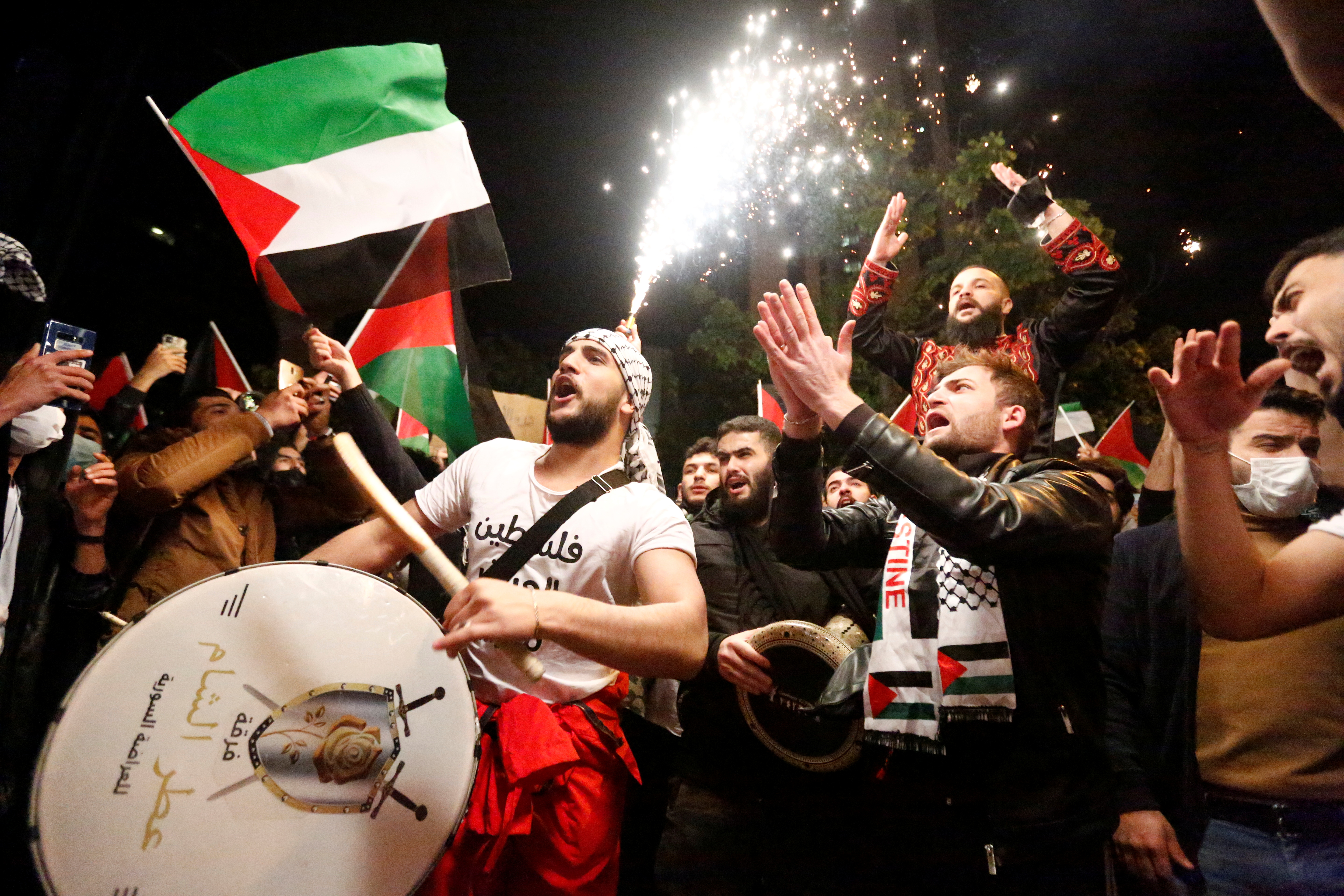 Protesters gather around Israel's consulate in Istanbul, Turkey (Reuters)