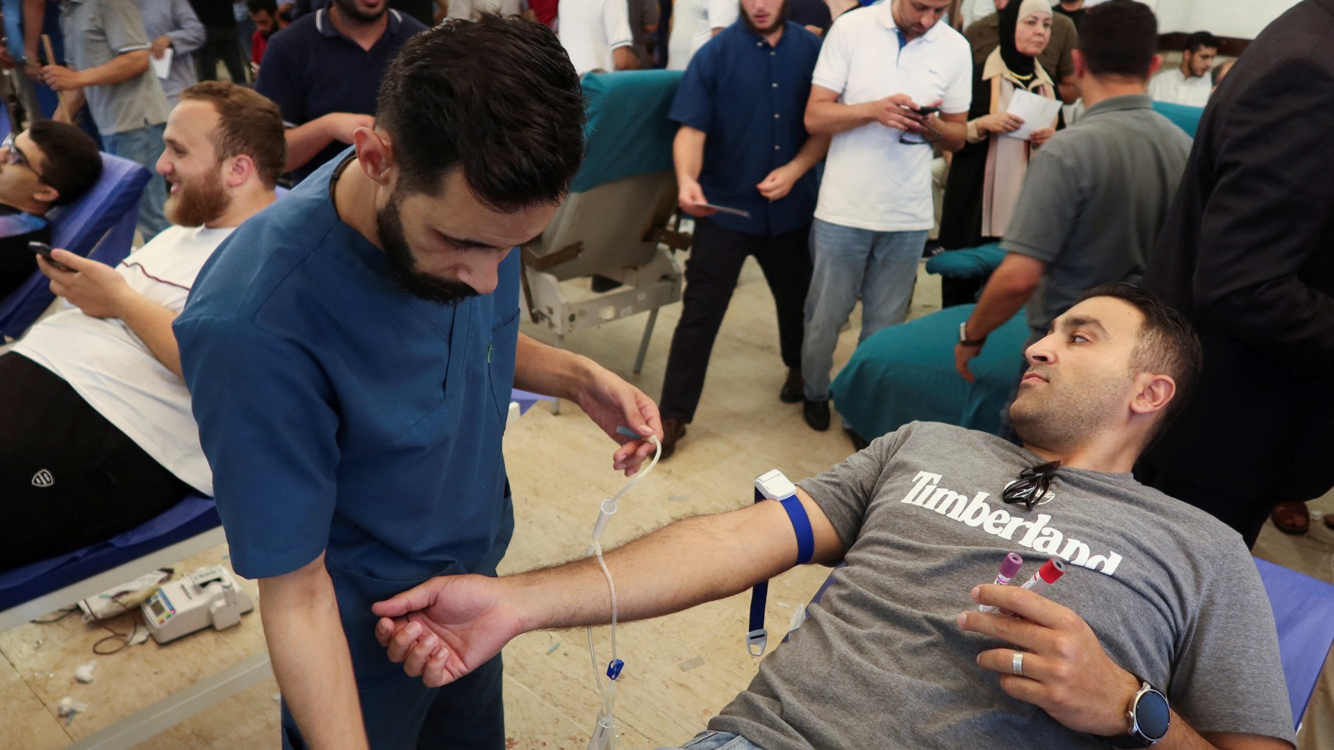 People donate blood during a blood donation campaign for Palestinians in Gaza, in Amman, Jordan June 28, 2024. REUTERS/Jehad Shelbak