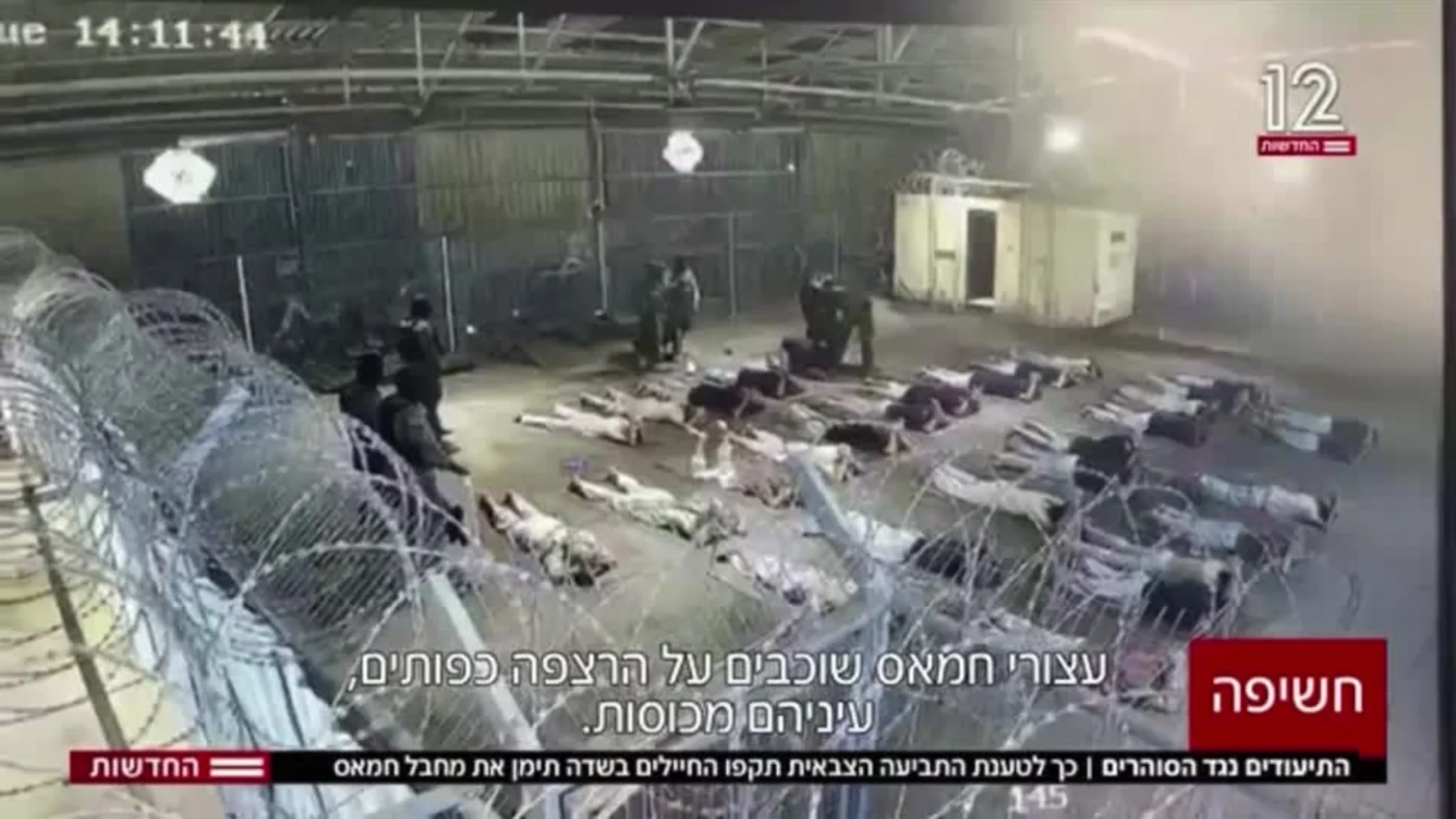 Israeli Channel 12 releases a video showing soldiers allegedly sexually abusing a Palestinian prisoner at Sde Teiman prison on 7 August 2024 (Reuters)