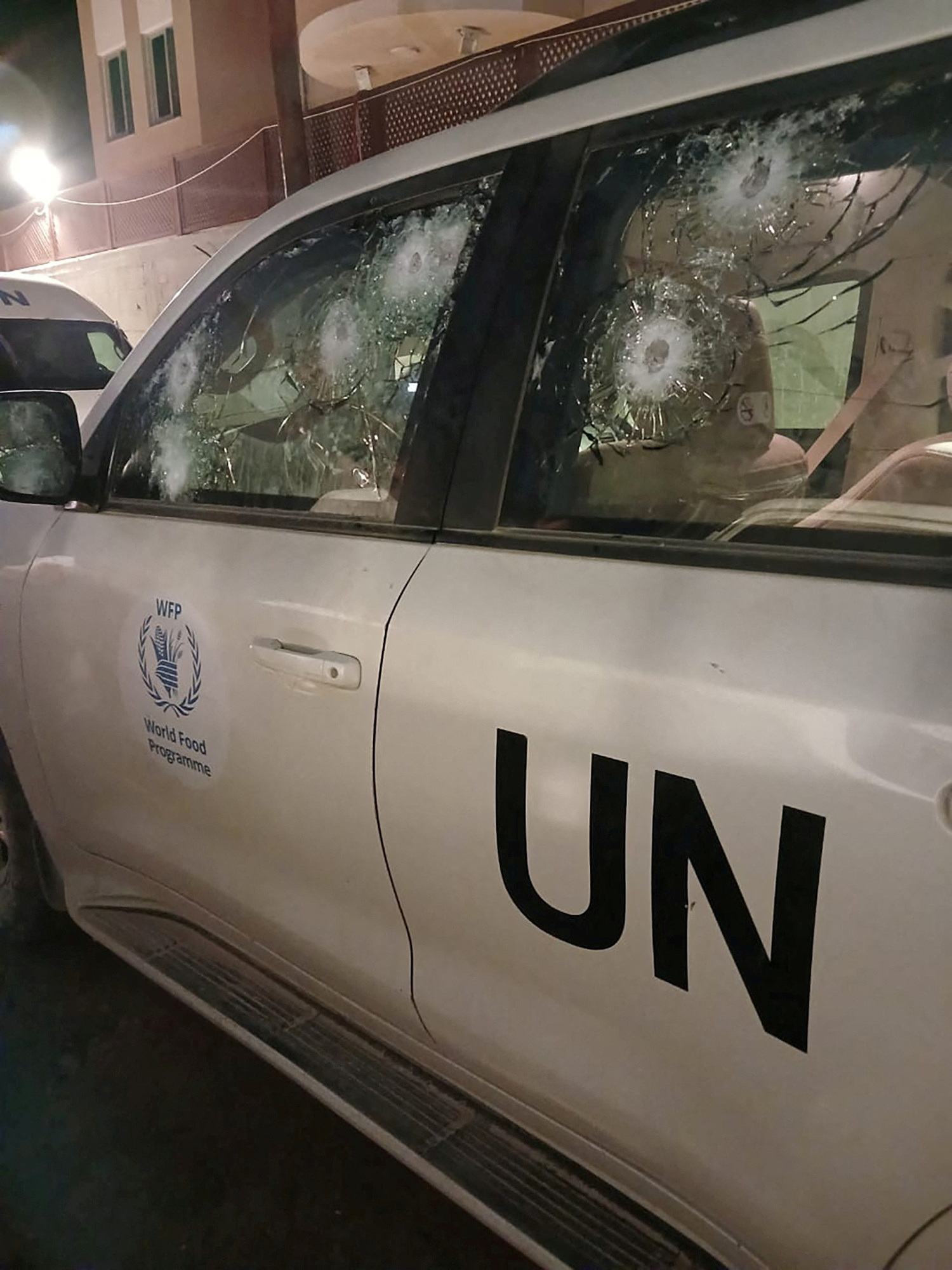  Impacts on a World Food Program's (WFP) bullet-proof windows are seen after the WFP said the vehicle came under fire a few metres from an Israeli check point at the Wadi Gaza bridge in Al-Mughraqa, Gaza Strip August 27, 2024. World Food Program/Handout via REUTERS THIS IMAGE HAS BEEN SUPPLIED BY A THIRD PARTY/File Photo