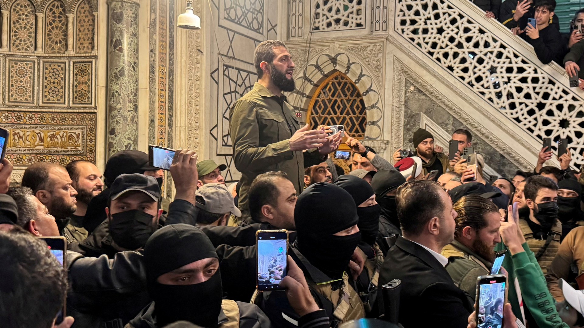 Top rebel commander Abu Mohammed al-Golani speaks to a crowd at Ummayad Mosque in Damascus, after Syrian rebels announced that they have ousted President Bashar al-Assad, Syria December 8, 2024