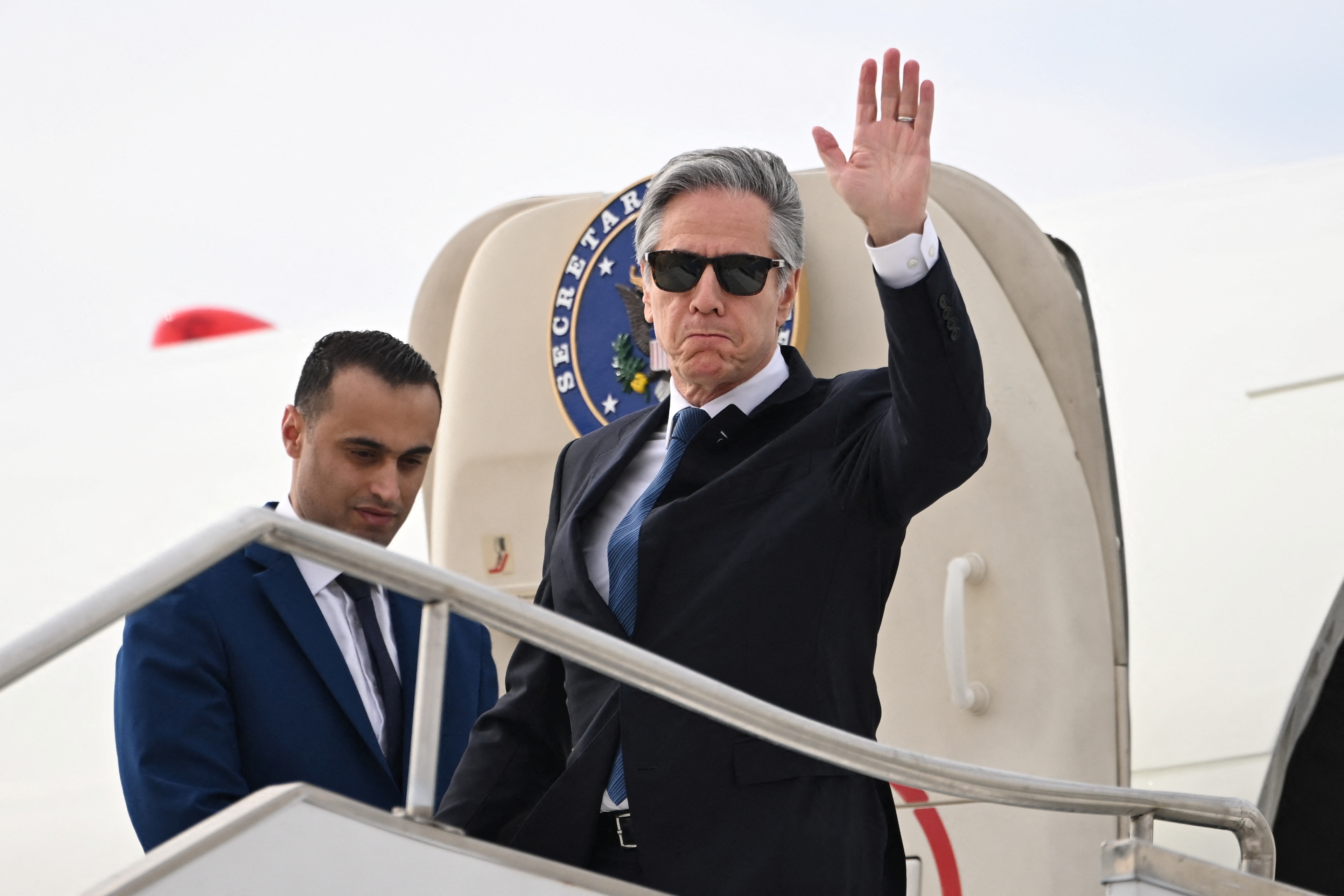 US Secretary of State Antony Blinken gestures upon his arrival in the Red Sea city of Aqaba in Jordan on December 12, 2024. Blinken started in Jordan a crisis tour following the overthrow of Syrian president Bashar al-Assad that will also take him to Turkey. ANDREW CABALLERO-REYNOLDS/Pool via REUTERS