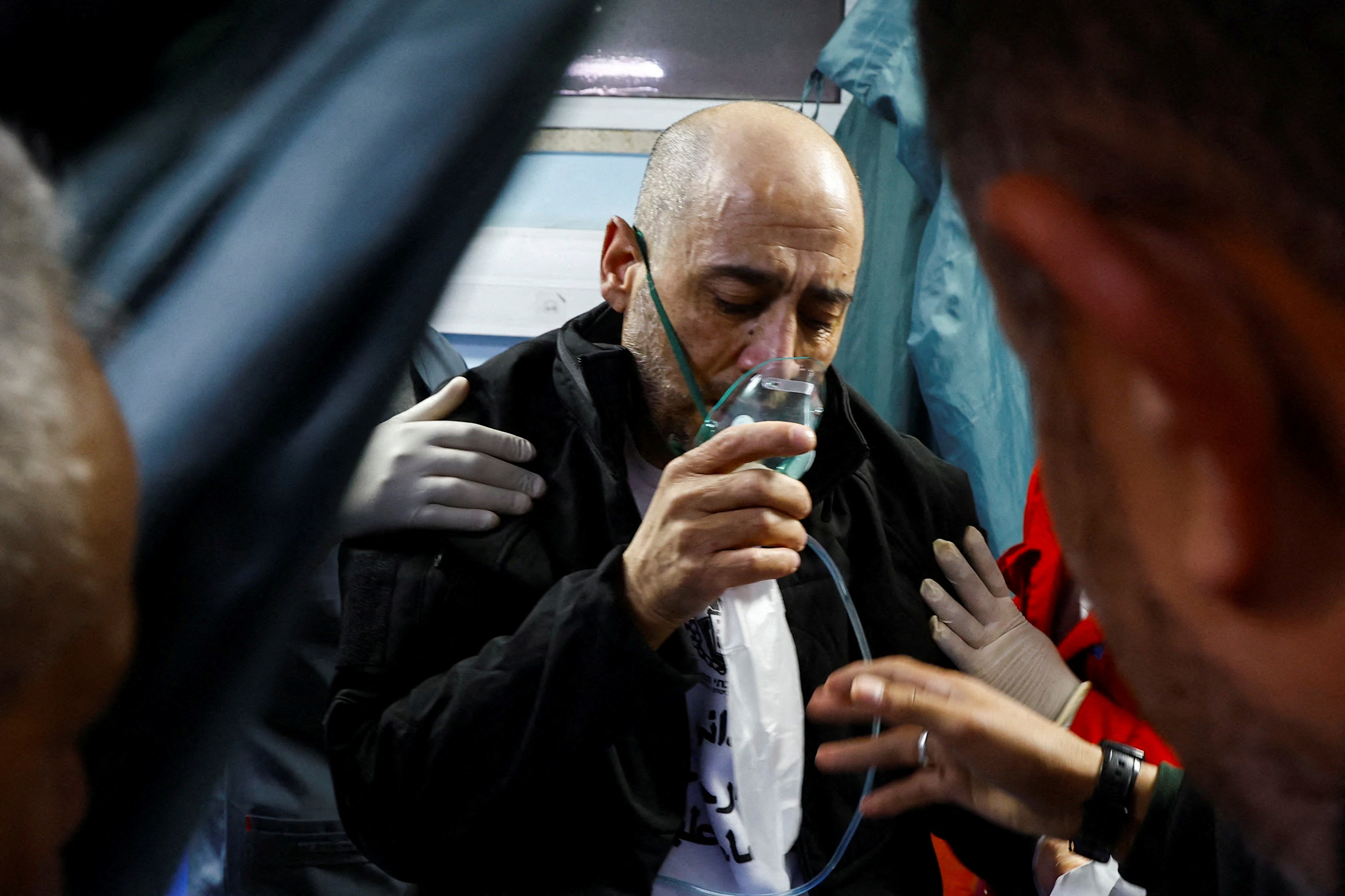 A freed Palestinian prisoner receives medical attention in Khan Younis, Gaza after being released from an Israeli jail as part of a ceasefire deal.(REUTERS/Hatem Khaled)