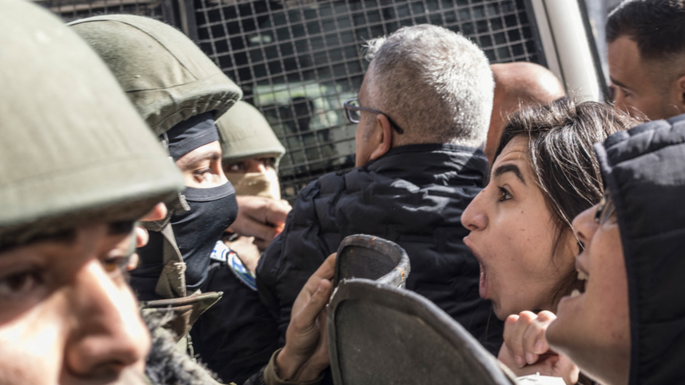 Demonstrators clash with Palestinian security forces in Ramallah, West Bank, in January 2024 (AFP)