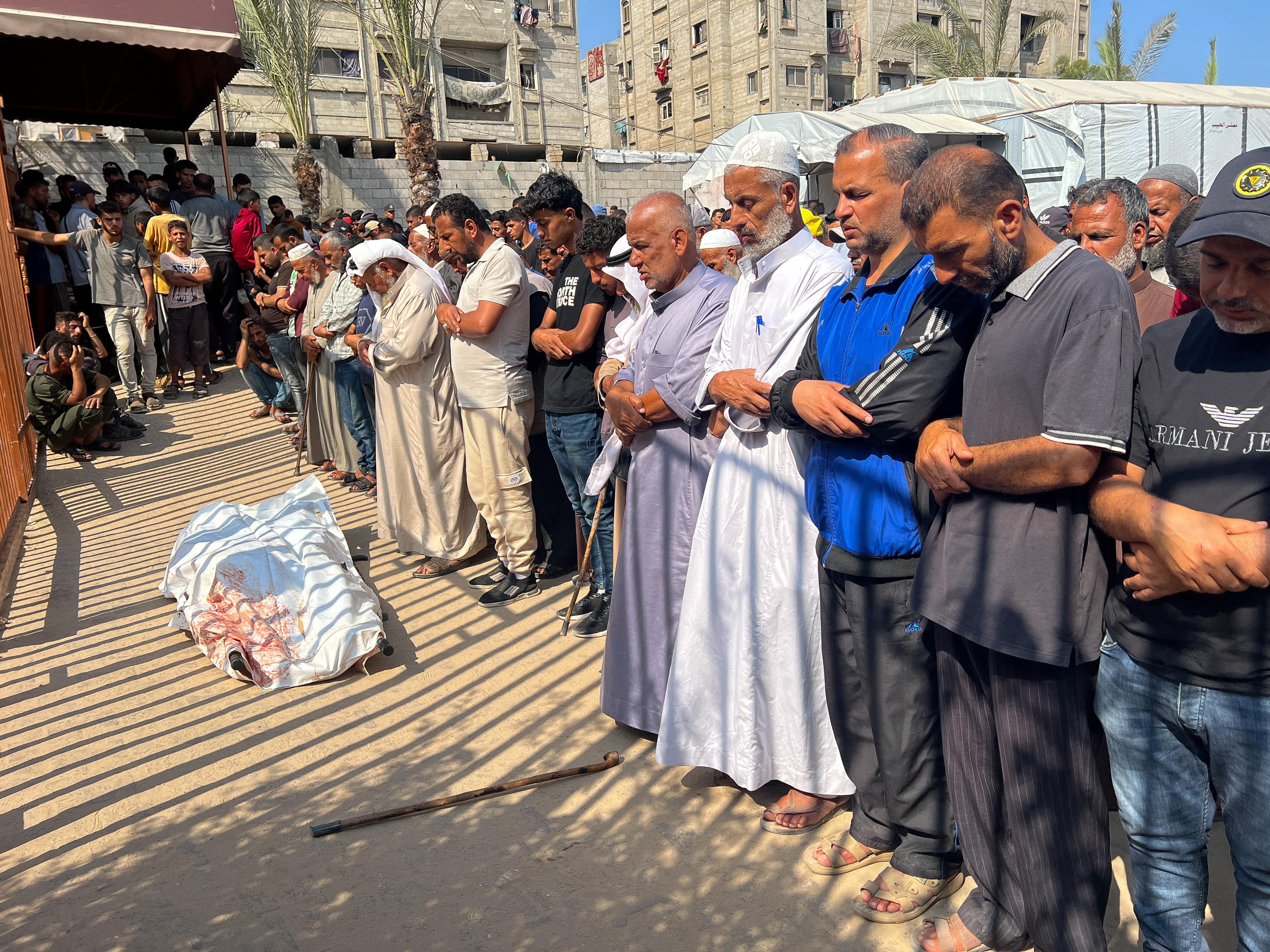Mourners pray during the funeral of a Palestinian killed, in what the Gaza health ministry says was Israeli fire near a distribution center in Rafah, at Nasser hospital in Khan Younis, in the southern Gaza Strip, June 9, 2025. REUTERS/Hussam Al-Masri