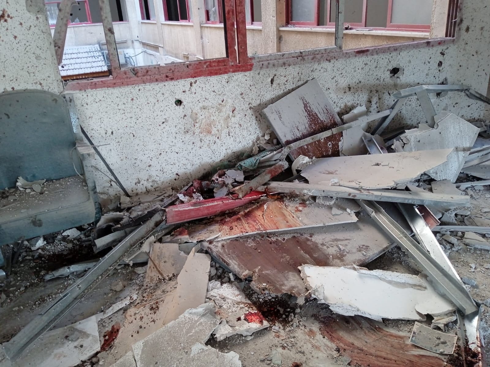 A view shows damaged property after a reported Israeli strike, at what the Palestine Red Crescent Society (PRCS) says is their headquarters, in a location given as Khan Younis in the southern Gaza Strip, in this handout photo released on August 3, 2025. 