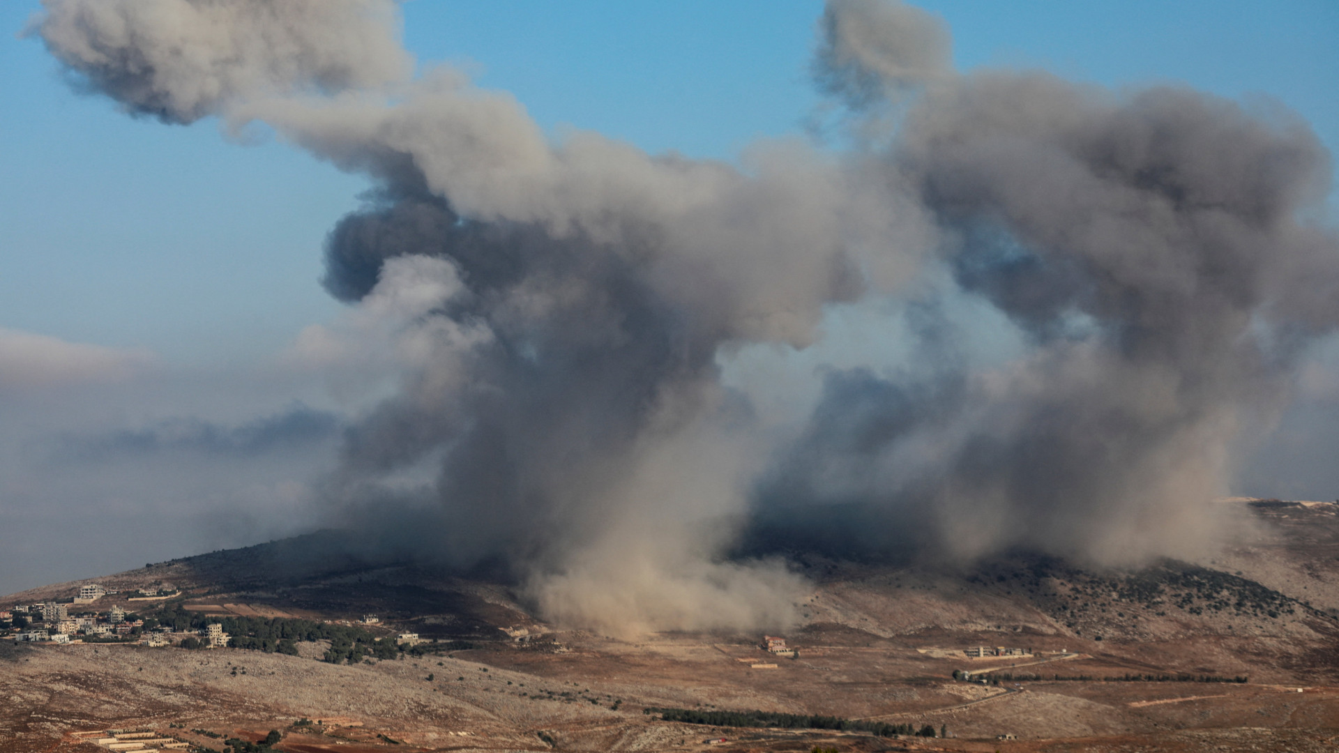 Smoke billows from Nabatieh district following Israeli strikes, as seen from Marjayoun in southern Lebanon, 31 August 2025 (Karamallah Daher/Reuters)