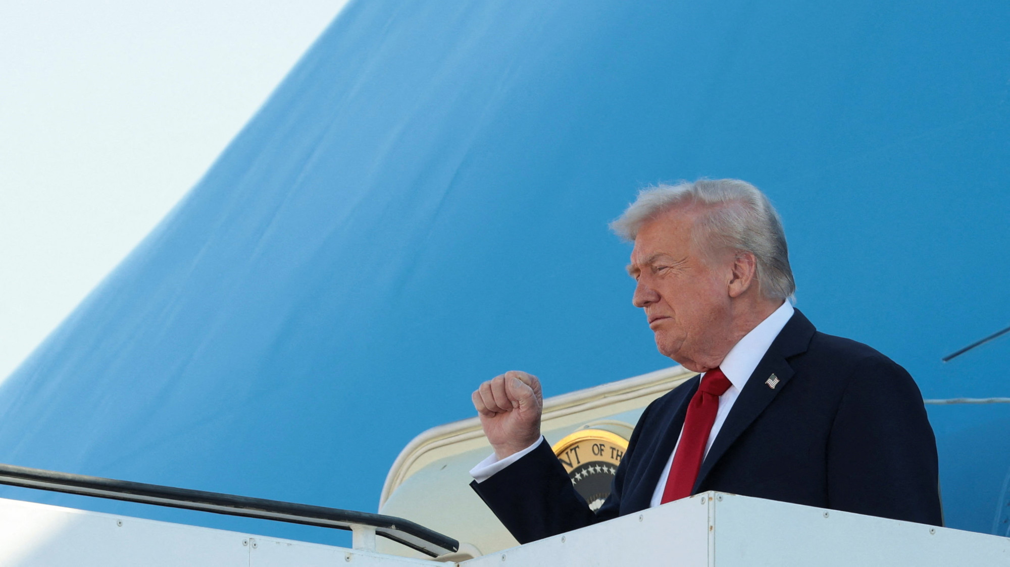 US President Donald Trump gestures as he disembarks Air Force One at Ben Gurion International Airport (Reuters/Evelyn Hockstein)